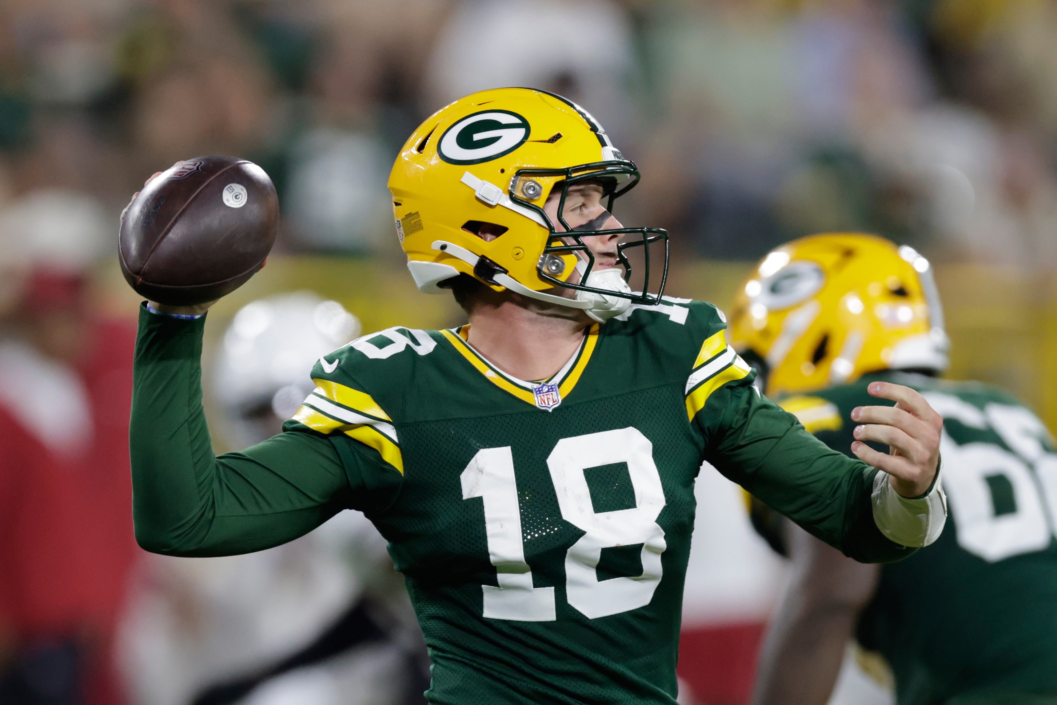 Green Bay Packers' Kyle McCord throws during the second half of a preseason NFL football game against the Arizona Cardinals Friday, Aug. 28, 2026, in Green Bay, Wis. 