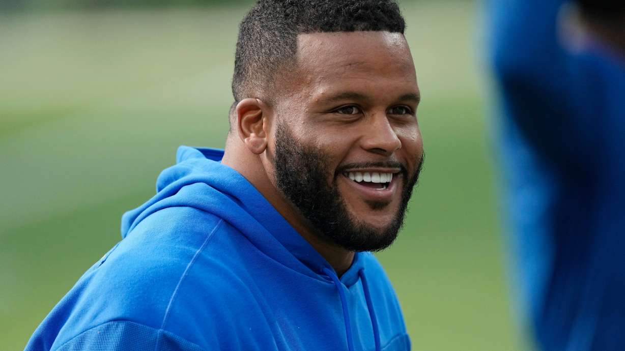 FILE - Los Angeles Rams defensive tackle Aaron Donald warms up before an NFL football game against the Cleveland Browns, Dec. 3, 2023, in Inglewood, Calif.