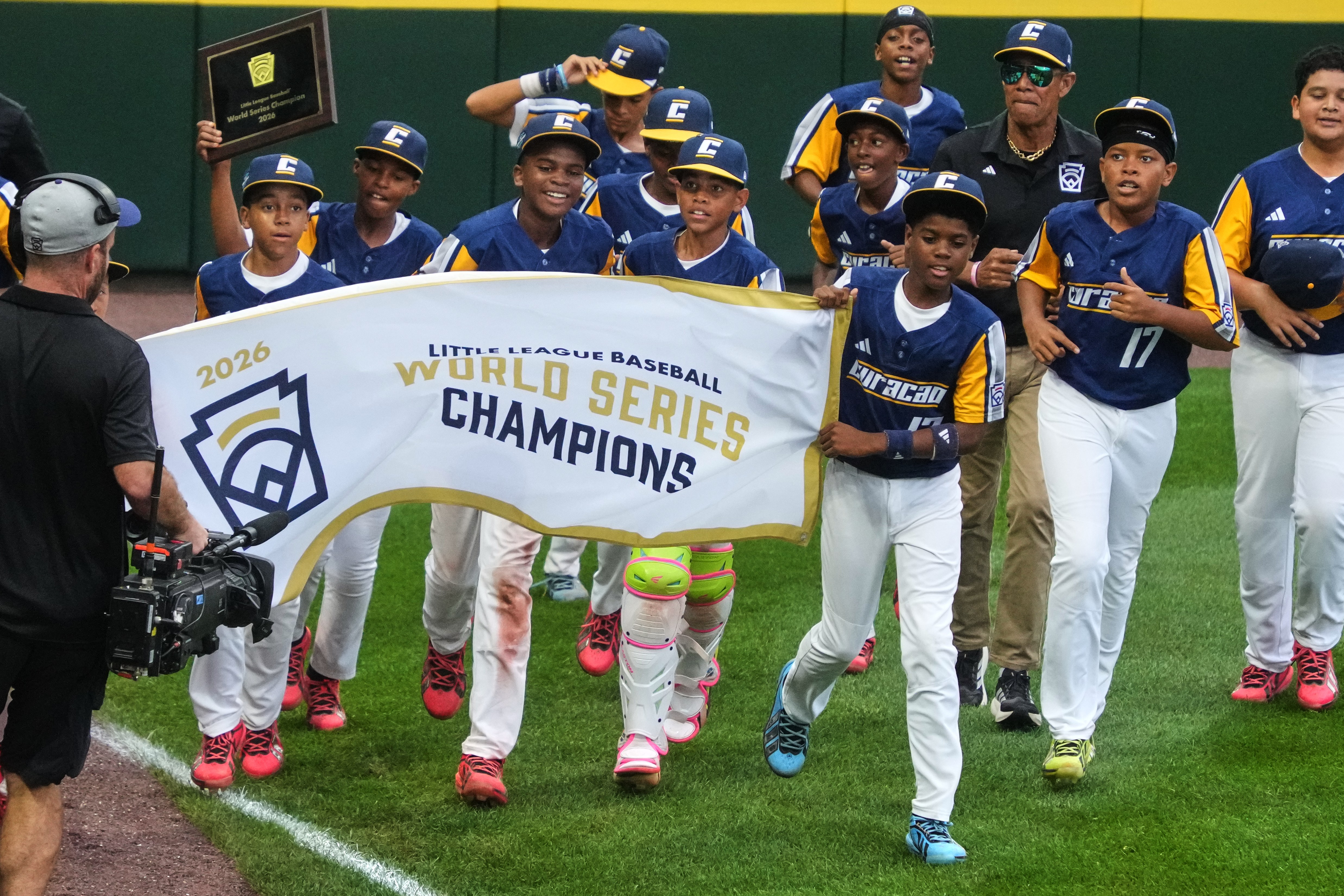 Curacao takes a victory lap after winning the Little League World Series Championship baseball game against Henderson, Nev., in South Williamsport, Pa., Sunday, Aug. 30, 2026. 