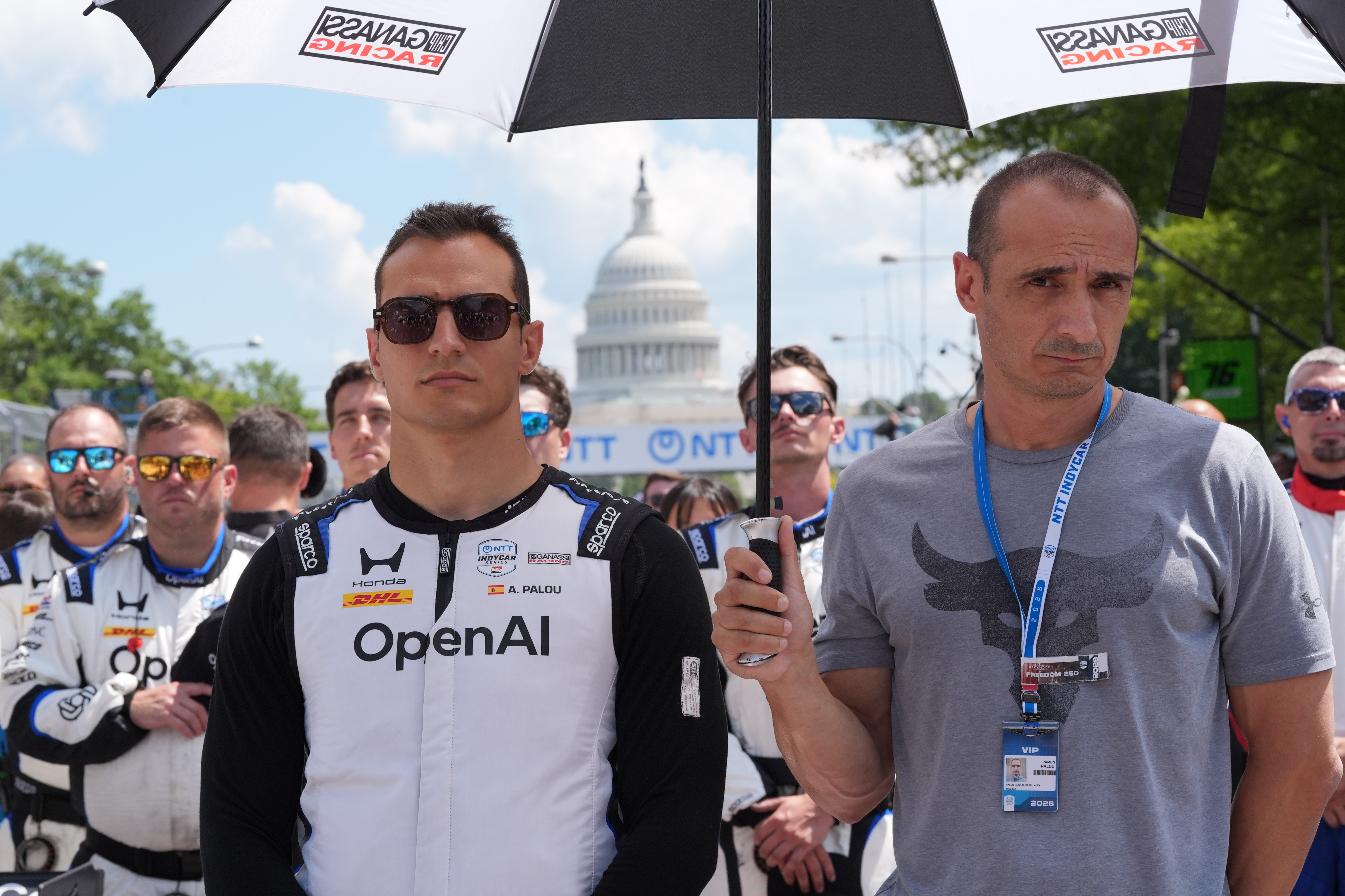 Alex Palou (10) of Spain stands during the National Anthem before the IndyCar Freedom 250 Grand Prix auto race in Washington, Sunday, Aug. 23, 2026.