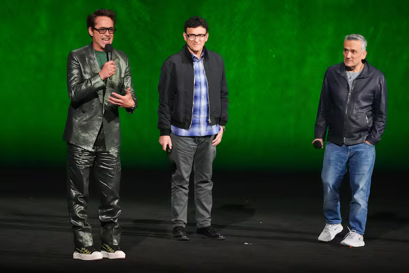 Cast member Robert Downey Jr., from left, director Anthony Russo, and director Joe Russo of the upcoming film "Avengers: Doomsday," speak during the Walt Disney Studios presentation at CinemaCon on Thursday, April 16, 2026, at Caesars Palace in Las Vegas.
