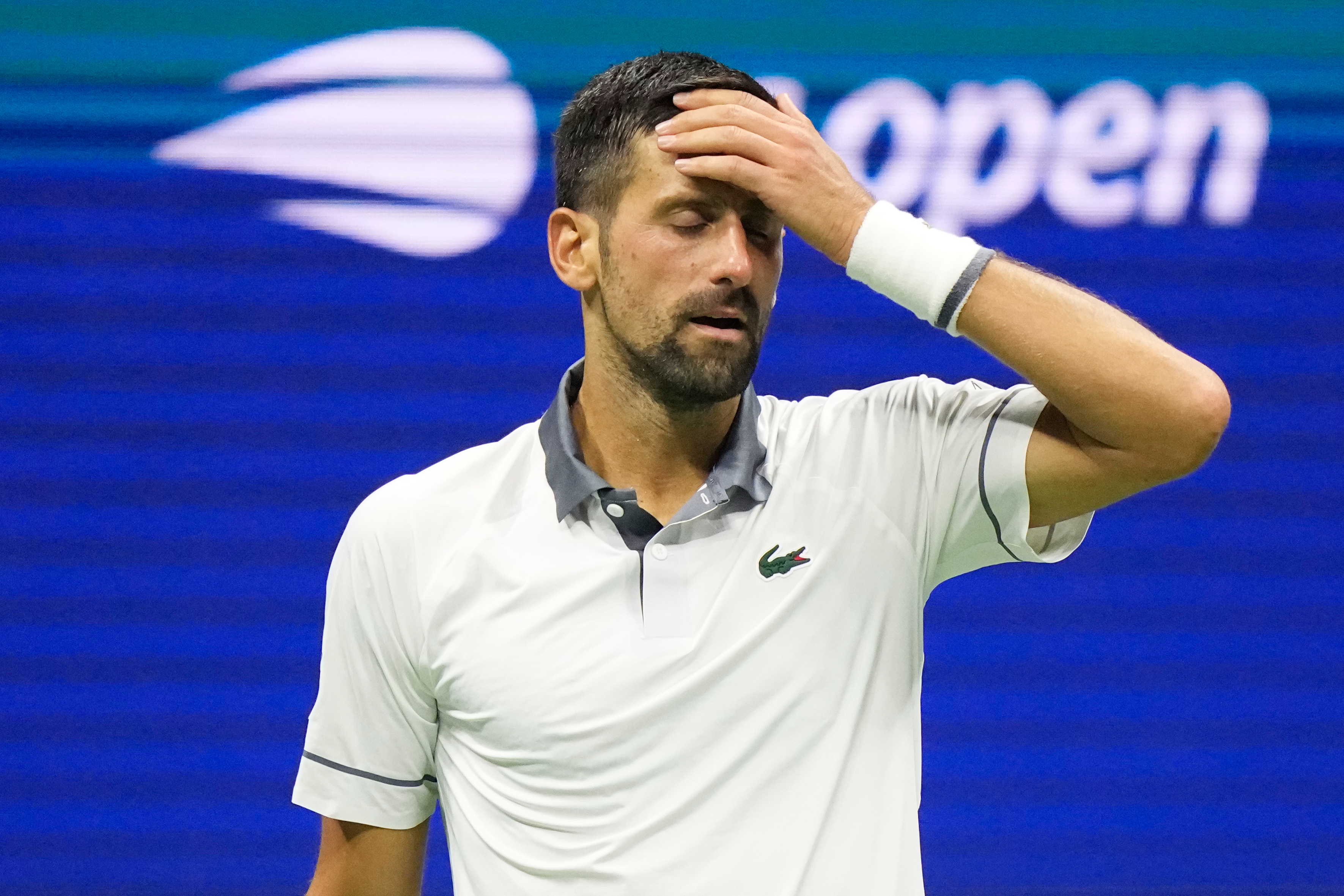 Novak Djokovic loses in opening round of US Open for first time, falling in 5 sets to Mariano Navone