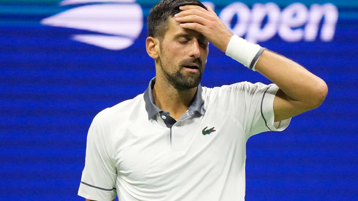 Novak Djokovic, of Serbia, reacts during the first round of the U.S. Open tennis championships against Mariano Navone, of Argentina, Sunday, Aug. 30, 2026, in New York.