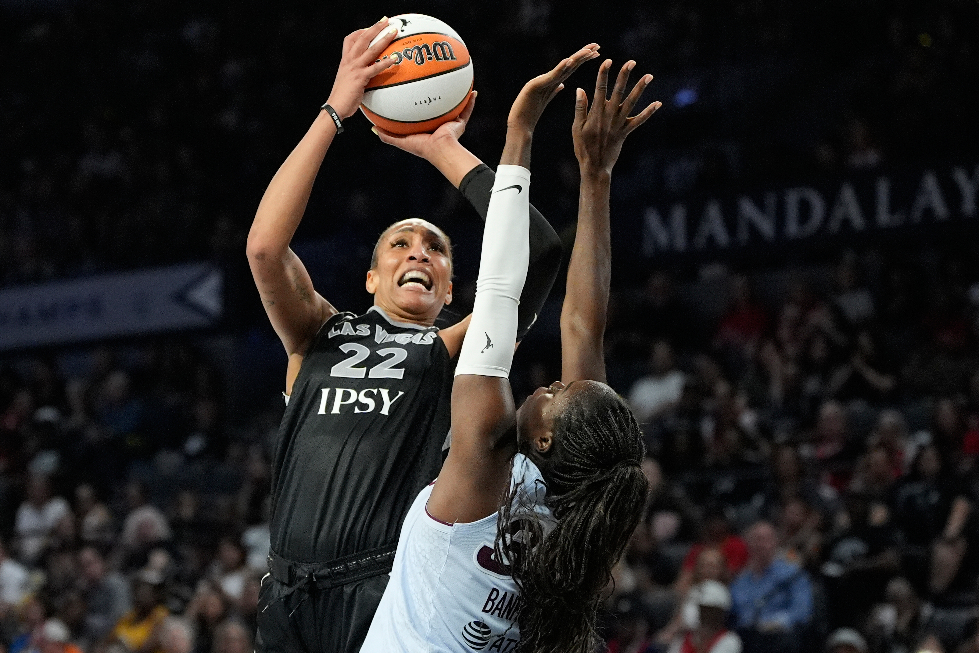 Las Vegas Aces center A'ja Wilson (22) shoots over Toronto Tempo guard Ornella Bankole (33) during the second half of a WNBA basketball game Friday, Aug. 28, 2026, in Las Vegas. 