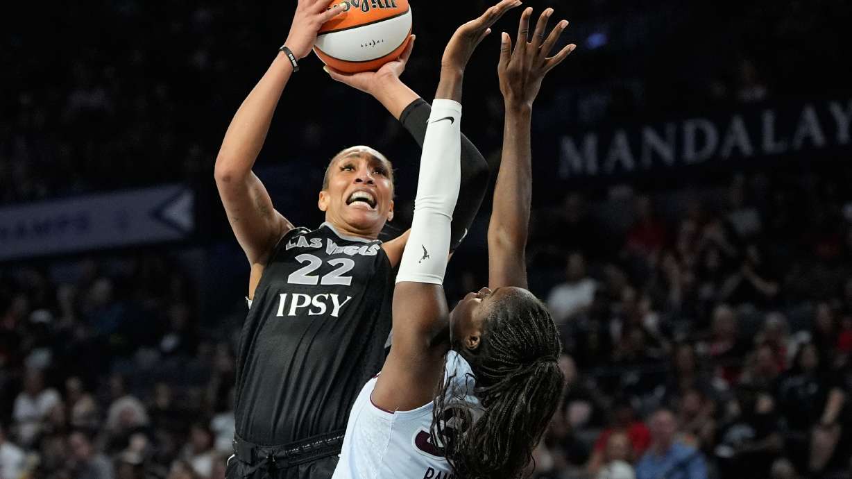 Las Vegas Aces center A'ja Wilson (22) shoots over Toronto Tempo guard Ornella Bankole (33) during the second half of a WNBA basketball game Friday, Aug. 28, 2026, in Las Vegas.