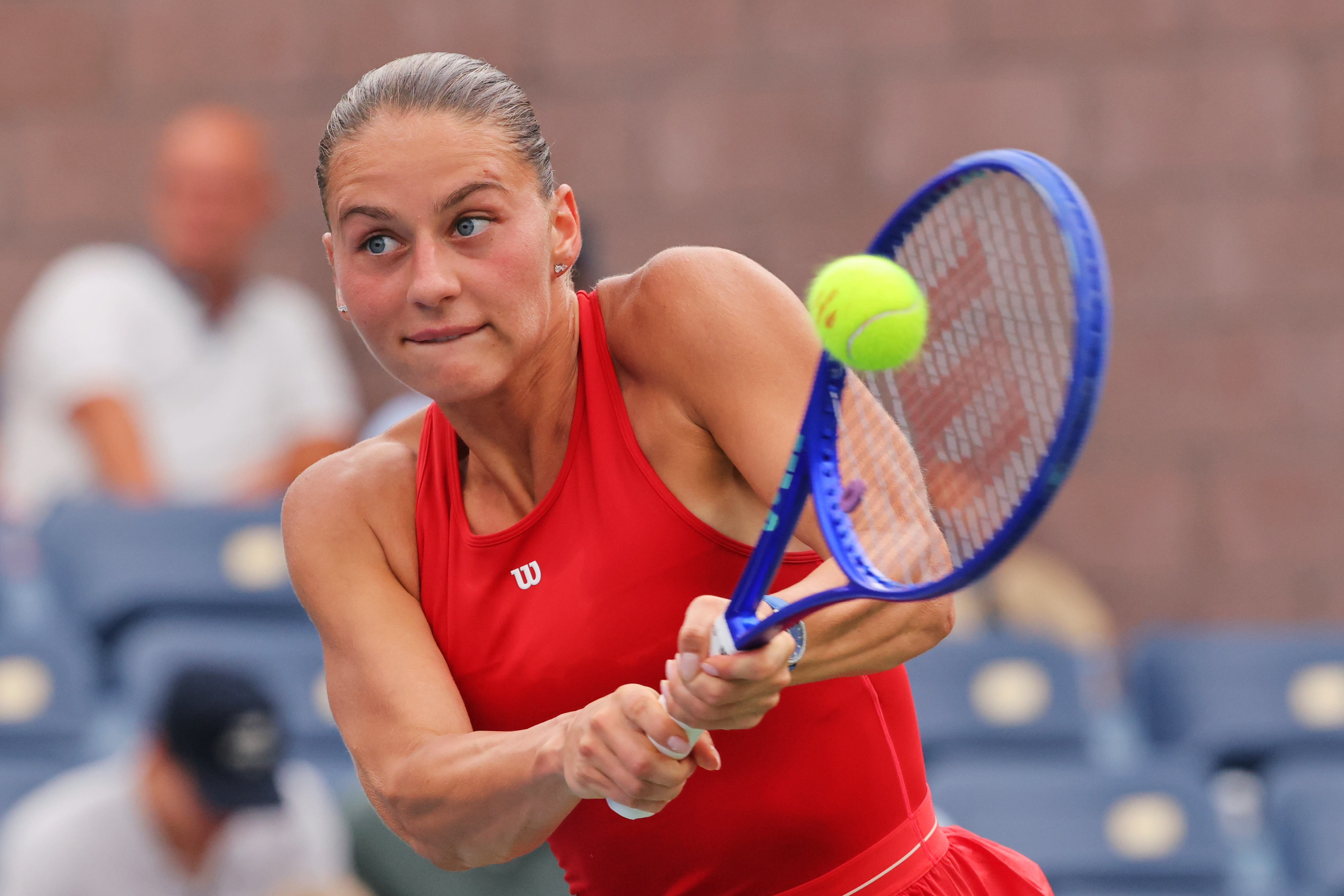 Marta Kostyuk, of Ukraine, returns the ball to Storm Hunter, of Australia, during the first round of the U.S. Open tennis championships, Sunday, Aug. 30, 2026, in New York. 