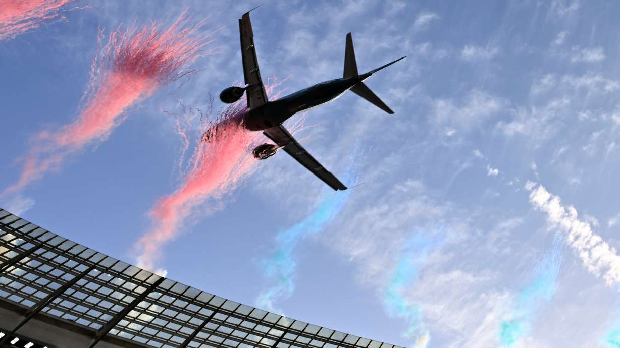 A jetliner flies over the stadium ahead of a second Test rugby match between South Africa and New Zealand, in Cape Town, South Africa, Saturday, Aug. 29, 2026.