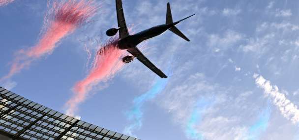 Dramatically low flyby by passenger jets over packed South African stadium sparks safety debate