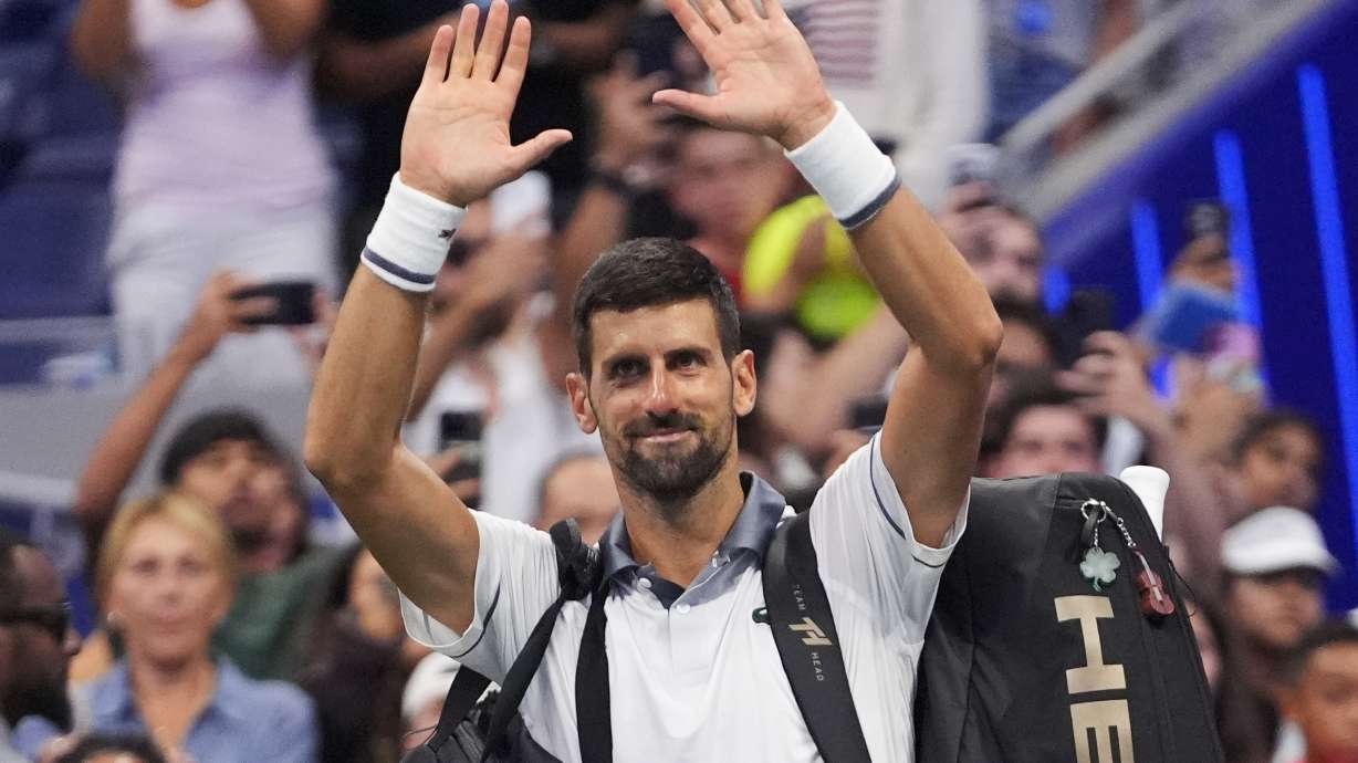 Novak Djokovic, of Serbia, gestures to the crowd after he lost to Mariano Navone, of Argentina, during the first round of the U.S. Open tennis championships Sunday, Aug. 30, 2026, in New York.