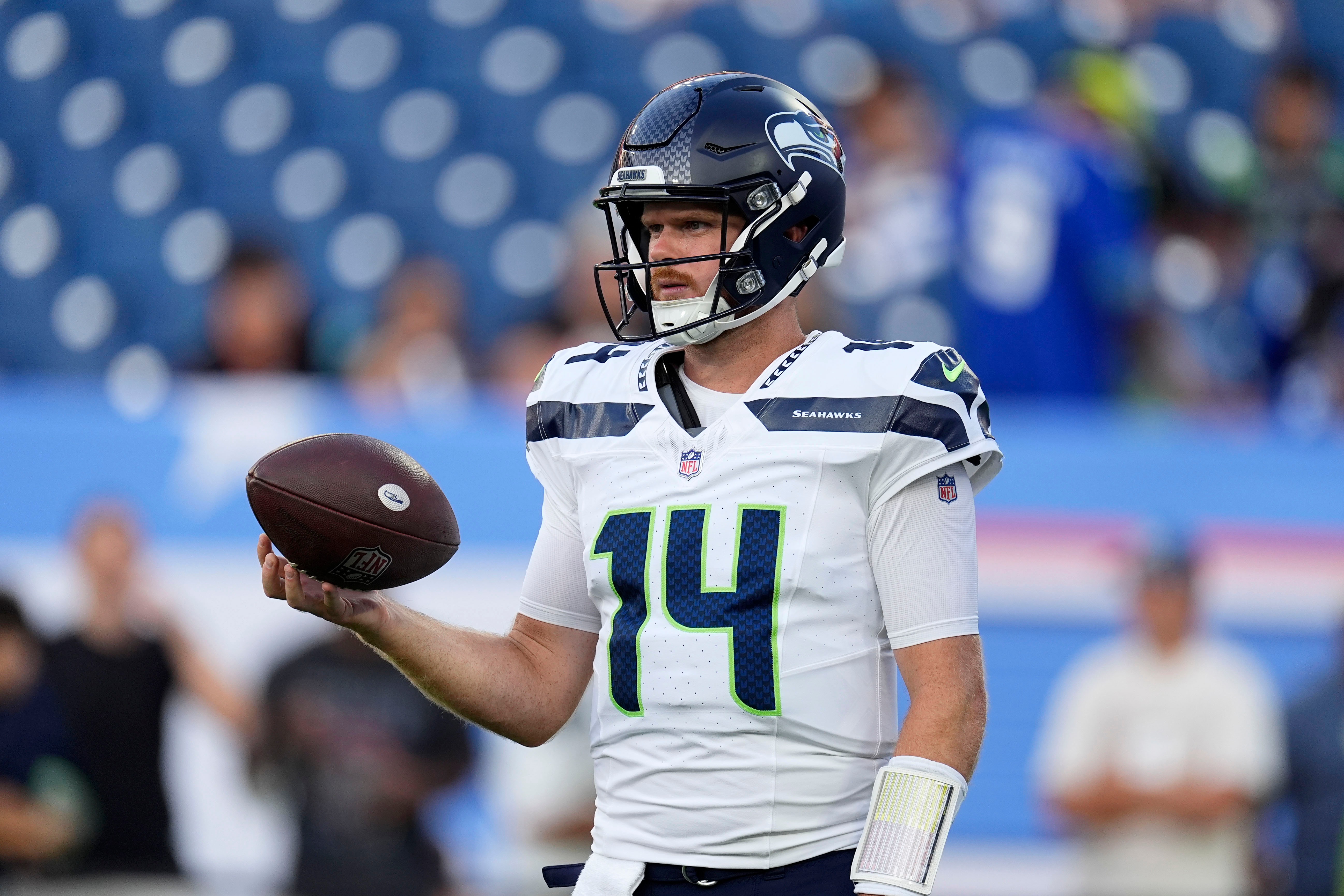 Seattle Seahawks quarterback Sam Darnold warms up before a preseason NFL football game against the Tennessee Titans, Sunday, Aug. 23, 2026, in Nashville, Tenn. 
