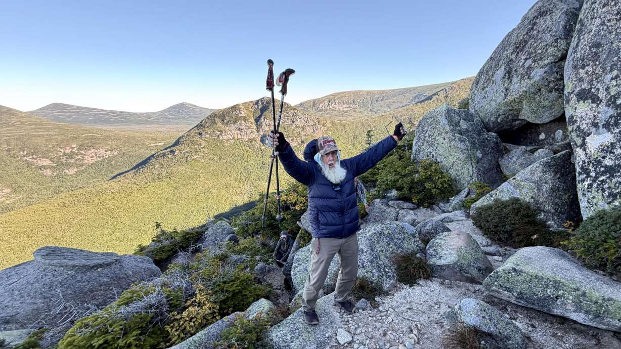 Dale Sanders, 91, celebrates after completing a difficult section of Mt. Katahdin, Monday, Aug. 31, 2026, in Baxter State Park in Piscataquis County, Maine.