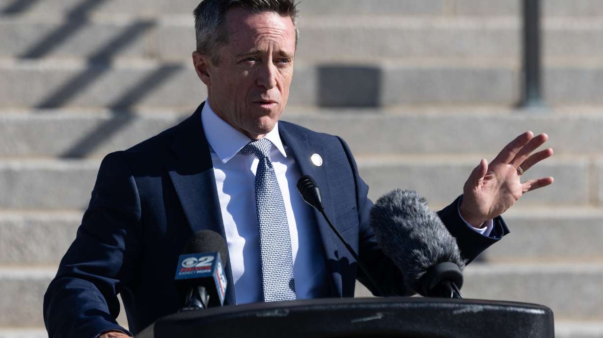 Utah Attorney General Derek Brown speaks on the steps of the Utah State Capitol in Salt Lake City on Monday to announce Utah's first Financial Crimes Intelligence Center to trace fraud, money laundering and crypto scams.