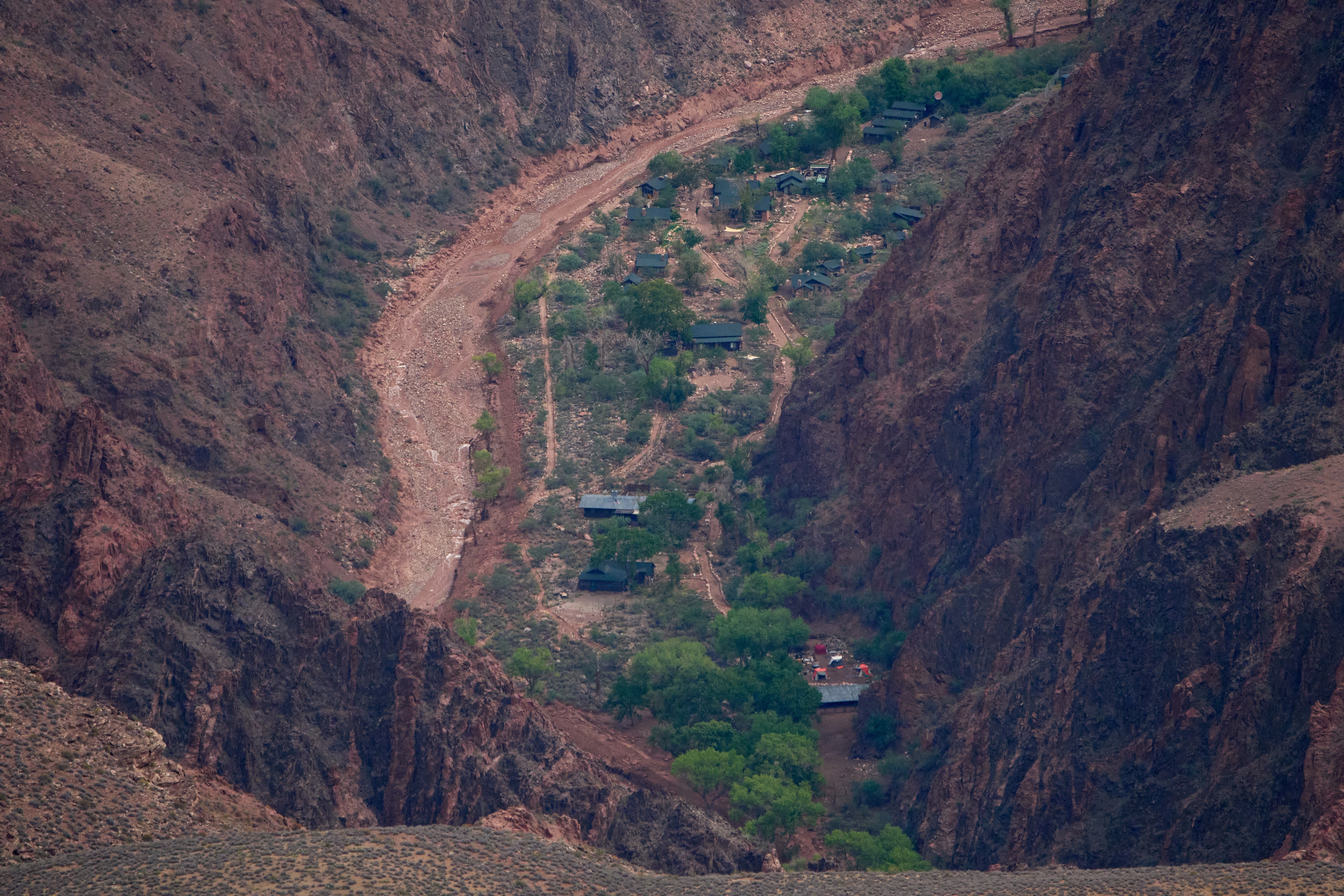 Buildings are seen in a flood-damaged Bright Angel Canyon in the Grand Canyon, Monday, in Grand Canyon National Park, Ariz.
