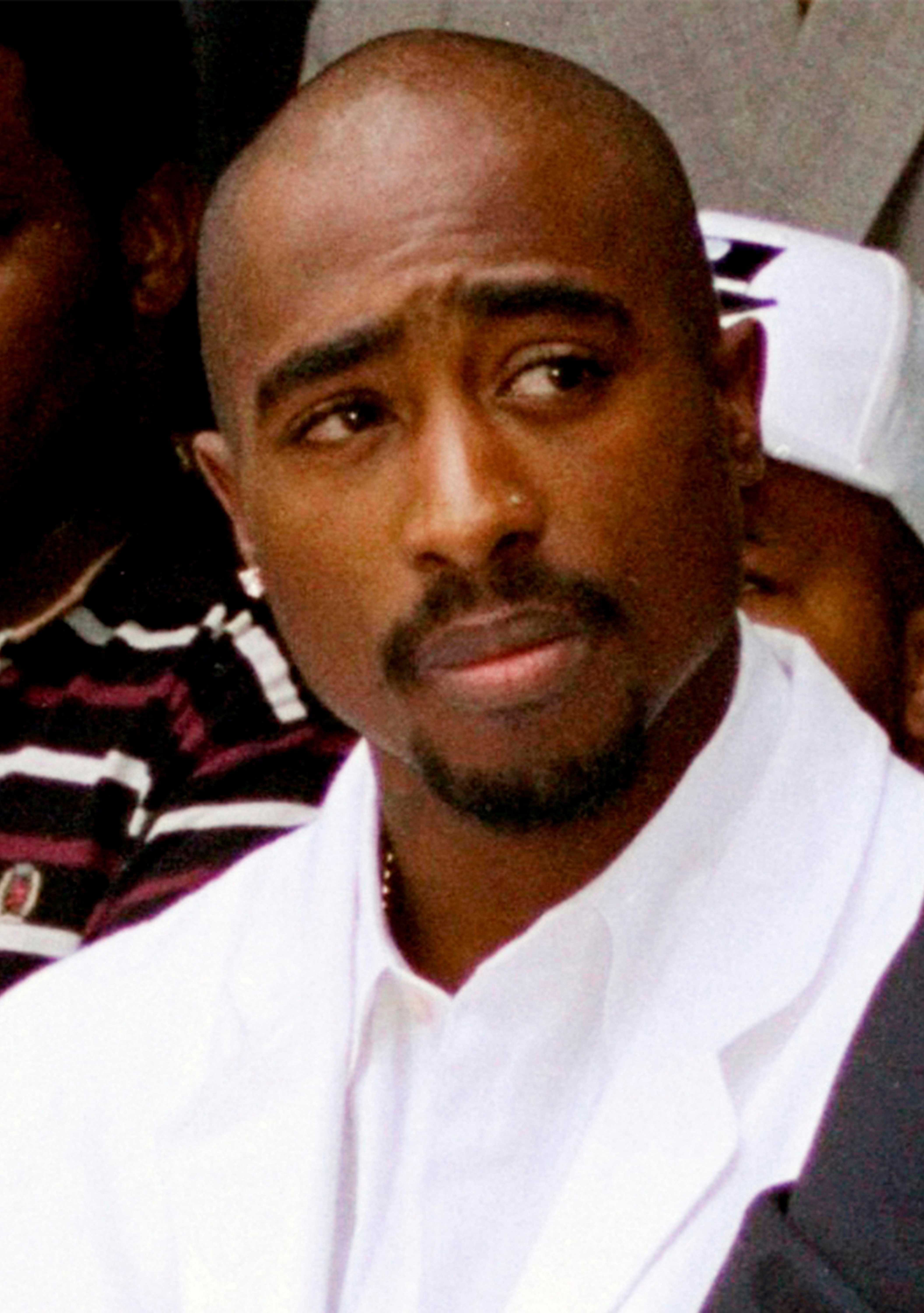 Rapper Tupac Shakur attends a voter registration event in South Central Los Angeles, Aug. 15, 1996.
