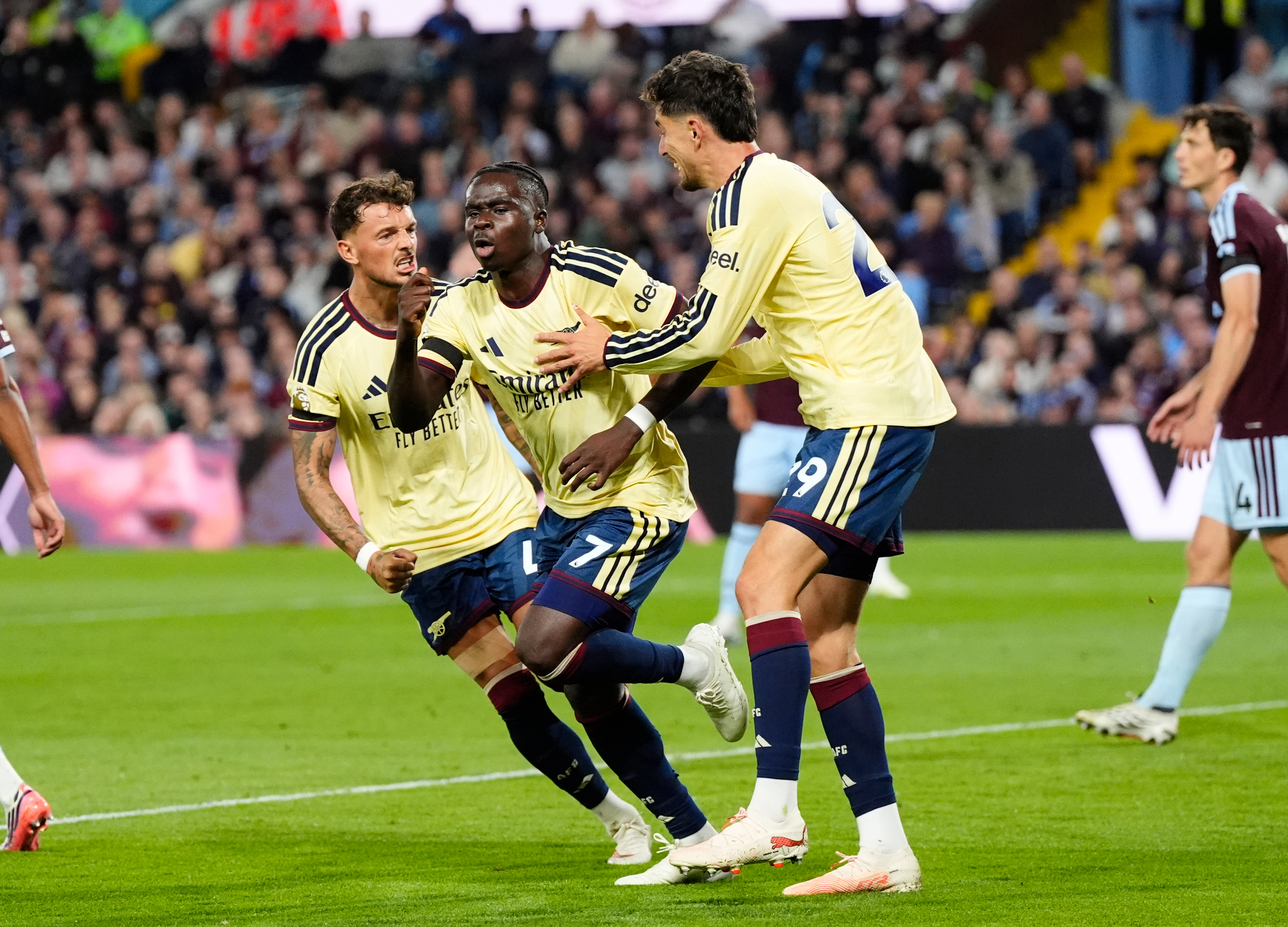 Arsenal's Bukayo Saka (7) celebrates after scoring his side's opening goal during the English Premier League soccer match between Aston Villa and Arsenal in Birmingham, England, Monday, Aug. 31, 2026. 