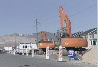 Man on Track Hoe Shocked by Power Lines