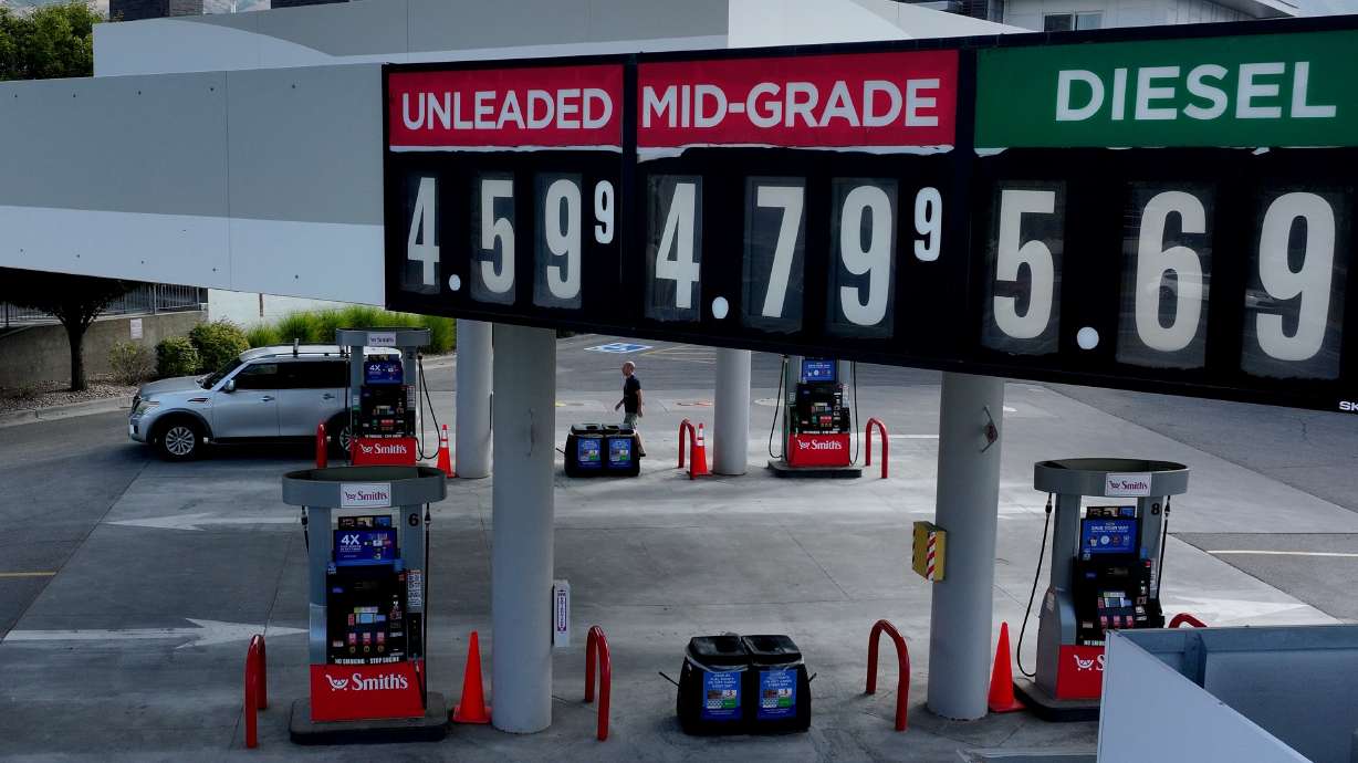 Gas prices are posted at Smith’s Fuel Center in Salt Lake City on Aug. 11. Experts say President Donald Trump's recent deal to open Venezuelan oil reserves would not impact fuel costs in the near term.