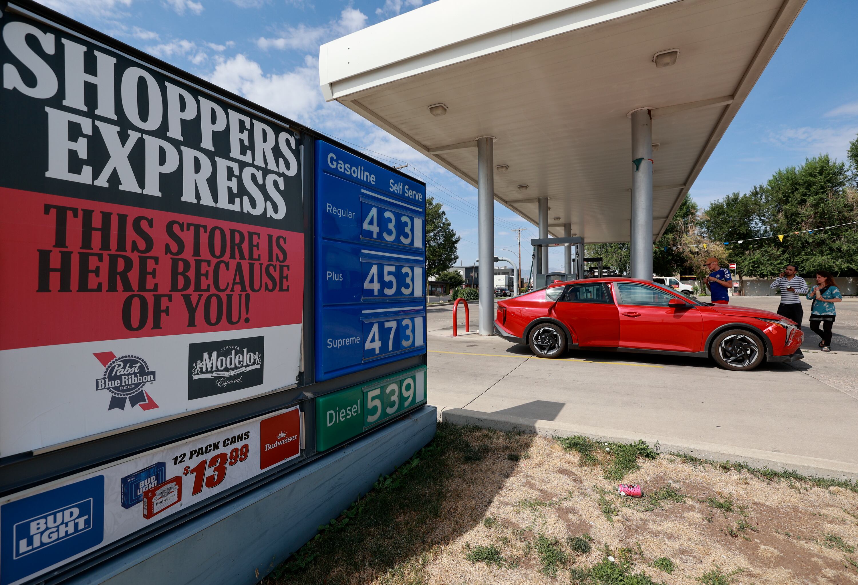 Gas prices are posted at Shoppers Express in Salt Lake City on Aug. 11. A deal struck by President Donald Trump to utilize Venezuelan oil reserves would have little impact on prices in the short term, experts said on Monday.