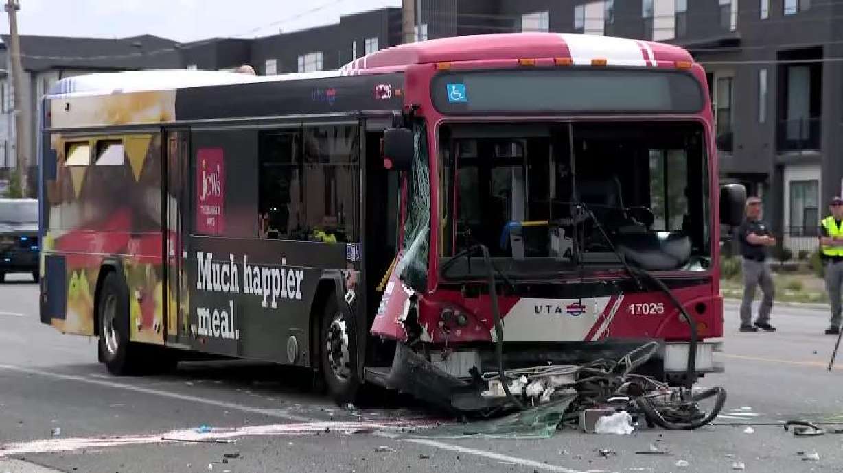 A UTA bus is pictured after getting into a head-on crash with a car on Monday. One person died and five were injured in the collision, police said.