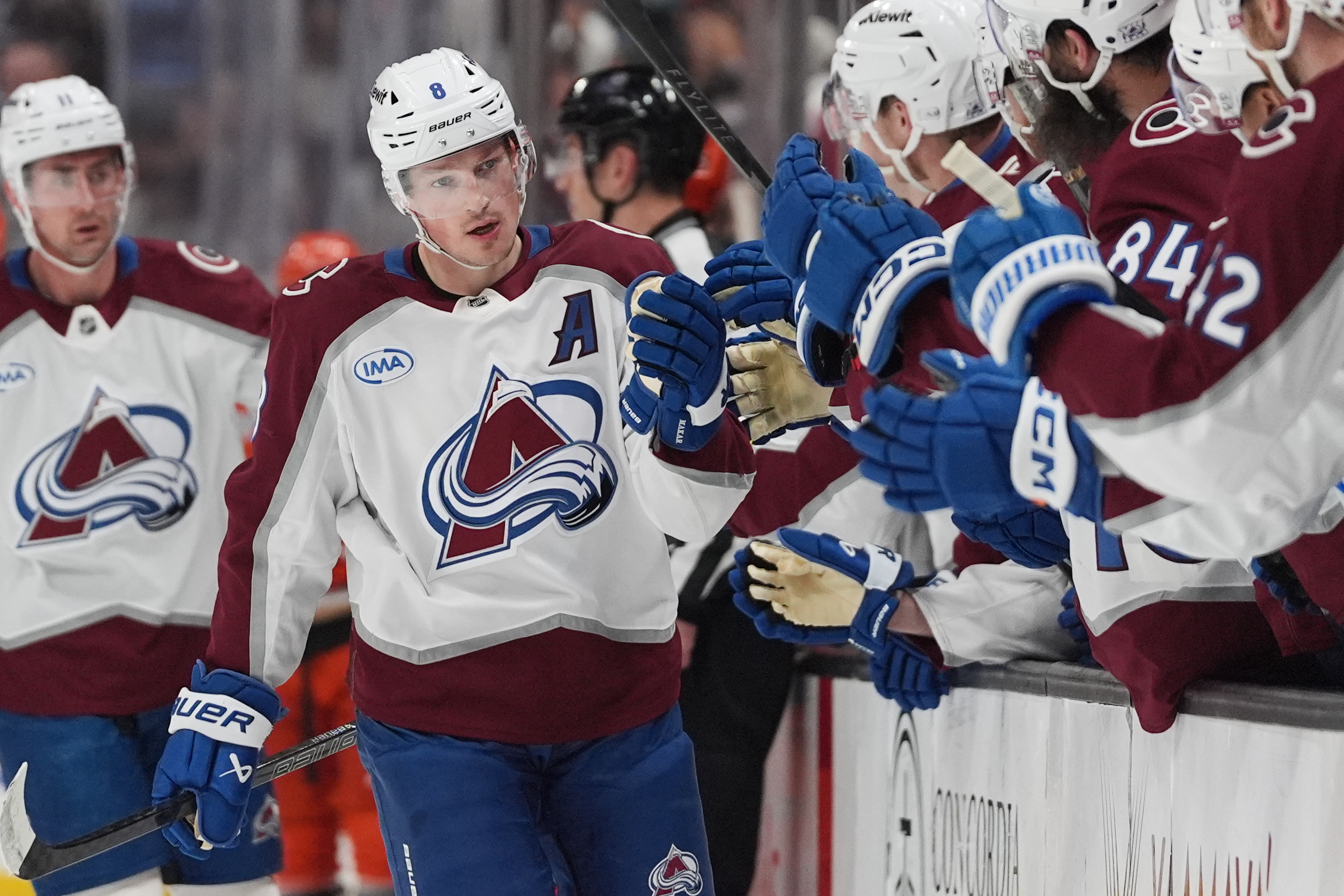 FILE - Colorado Avalanche defenseman Cale Makar, center, celebrates his goal with teammates during the first period of an NHL hockey game against the Anaheim Ducks, March 3, 2026, in Anaheim, Calif. 