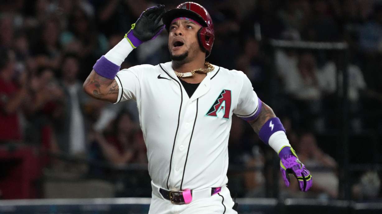 Arizona Diamondbacks' Ketel Marte reacts after hitting a two-run home run against the Los Angeles Dodgers in the first inning of a baseball game, Sunday, Aug 9, 2026, in Phoenix.