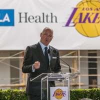 UCLA ousts athletic director Martin Jarmond, taps former Lakers executive Tim Harris to replace him