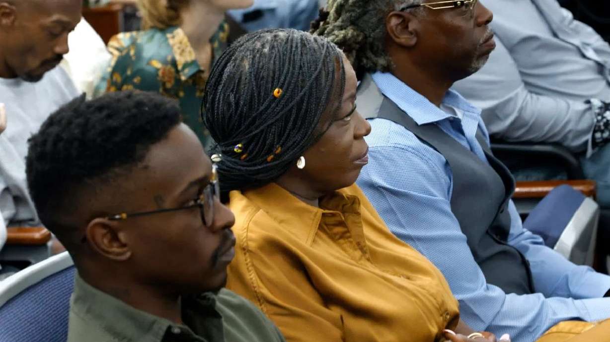 Family members of rapper Tupac Shakur, including his sister Sekyiwa Shakur (center), attend the murder trial of Duane Davis in Las Vegas on August 21.