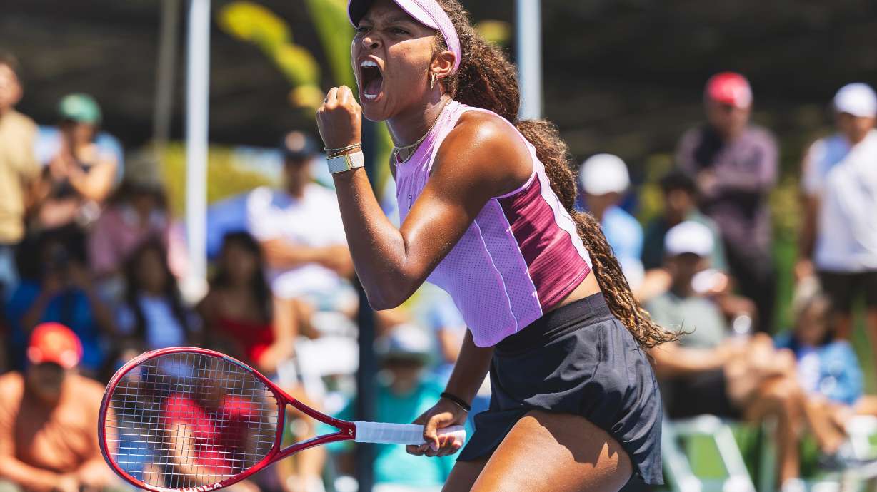 In this photo provided by USTA, Thea Frodin, 17, pumps her fist during a match at the USTA Billie Jean King Girls' 18s National Championships to earn a wild card into the U.S. Open on Aug. 16, 2026, in San Diego.