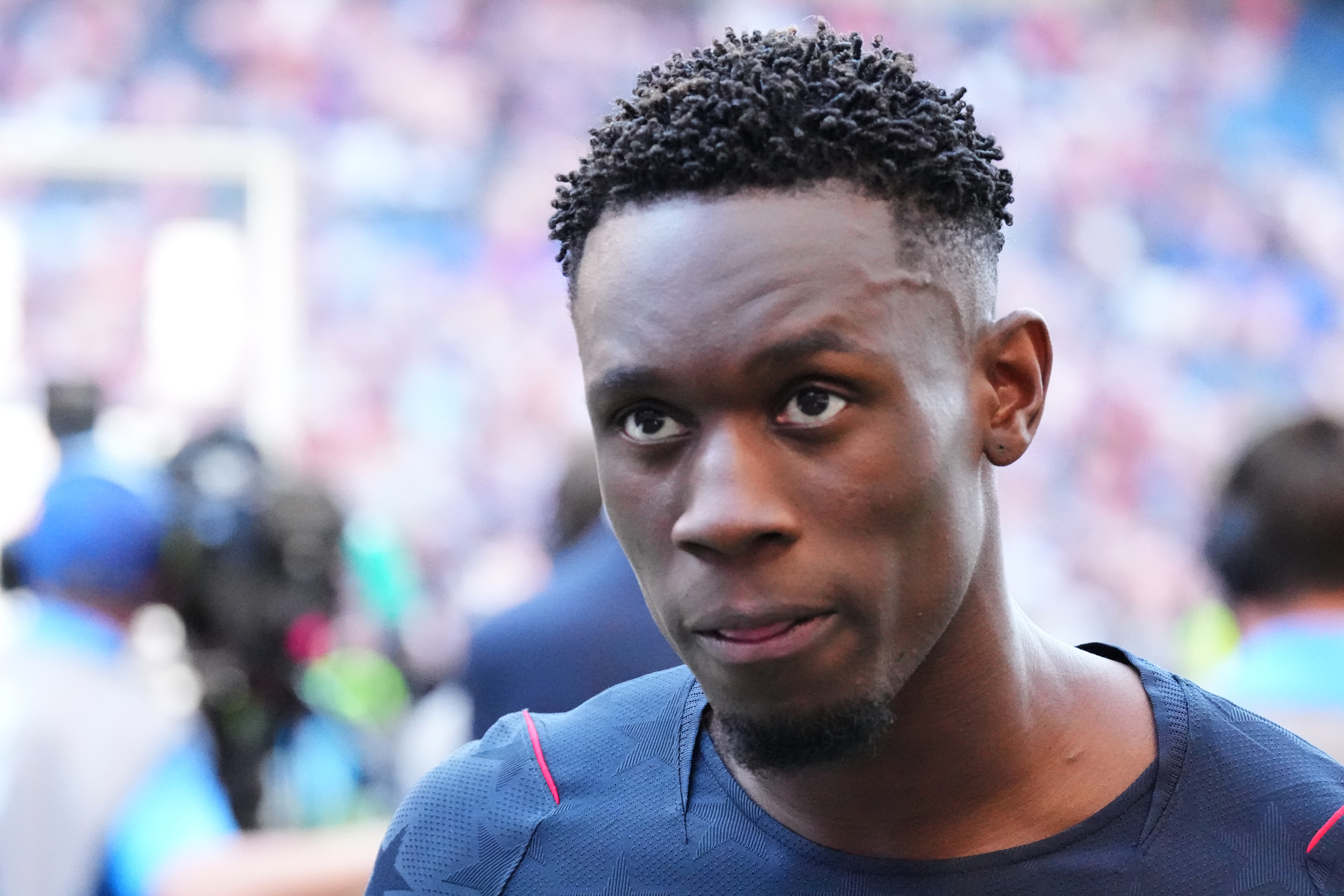 FILE - United States' Folarin Balogun (20) walks off the pitch after losing to Belgium in their World Cup round of 16 soccer match in Seattle, on July 6, 2026. 