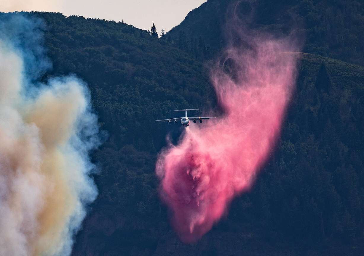 Firefighters release fire retardant on a wildfire in Rocky Canyon near Henefer, Summit County, on Aug. 10. Utah has been in an endless water crisis cycle of fires, floods and drought.