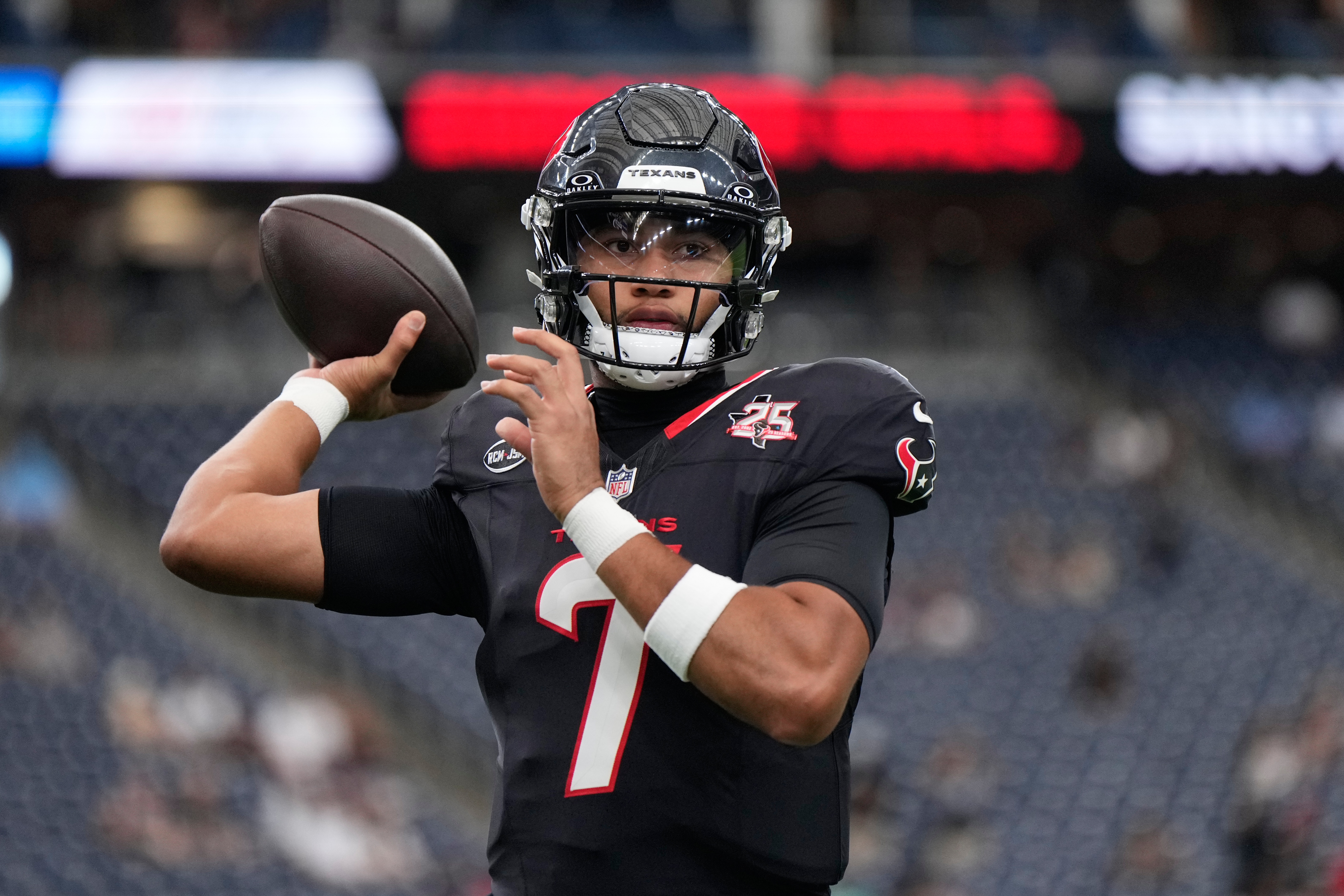 Houston Texans quarterback C.J. Stroud (7) throws before an NFL preseason football game against the Las Vegas Raiders, Thursday, Aug. 20, 2026, in Houston. 