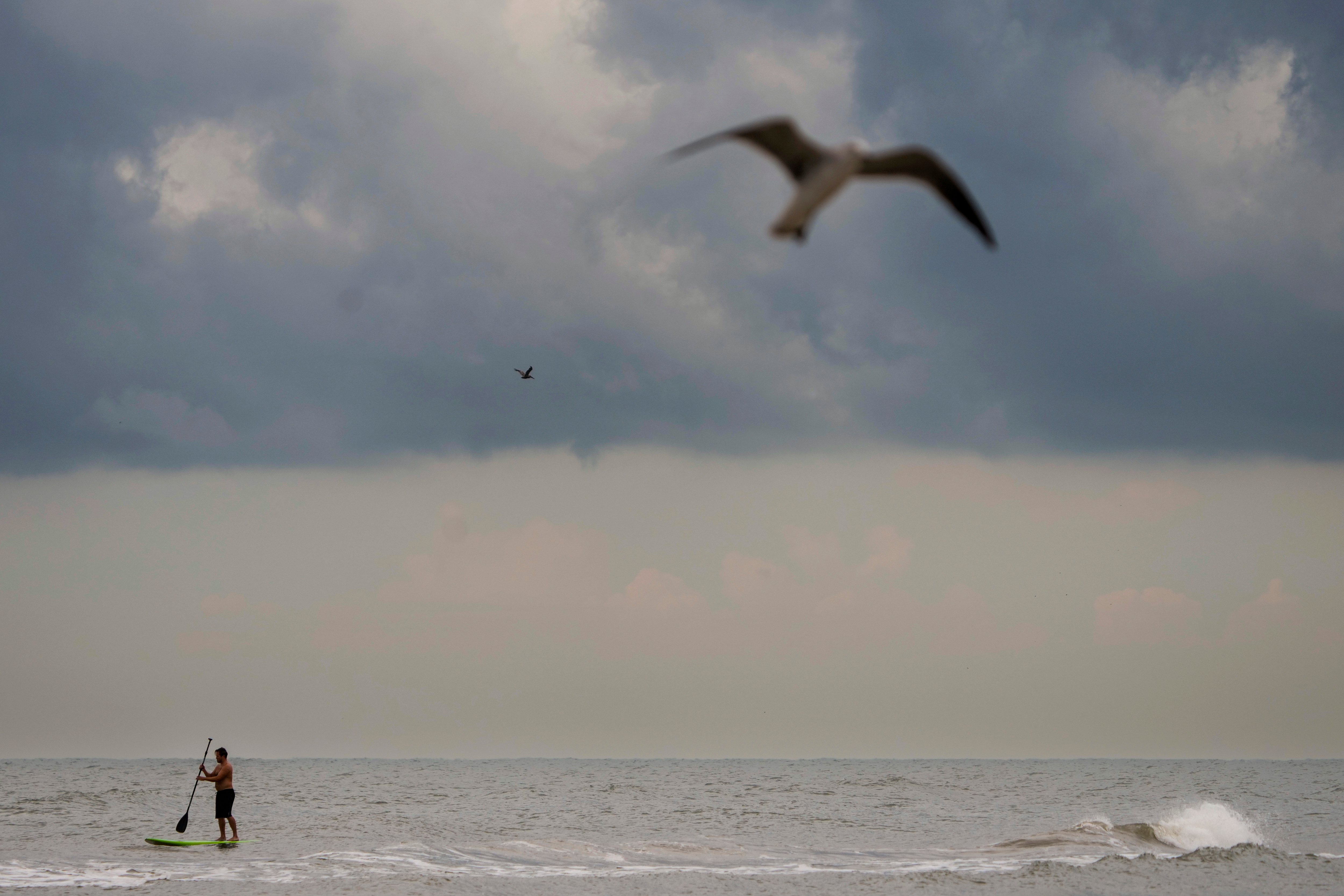 Tropical Storm Edouard makes landfall on the Gulf Coast, bringing the possibility of flooding