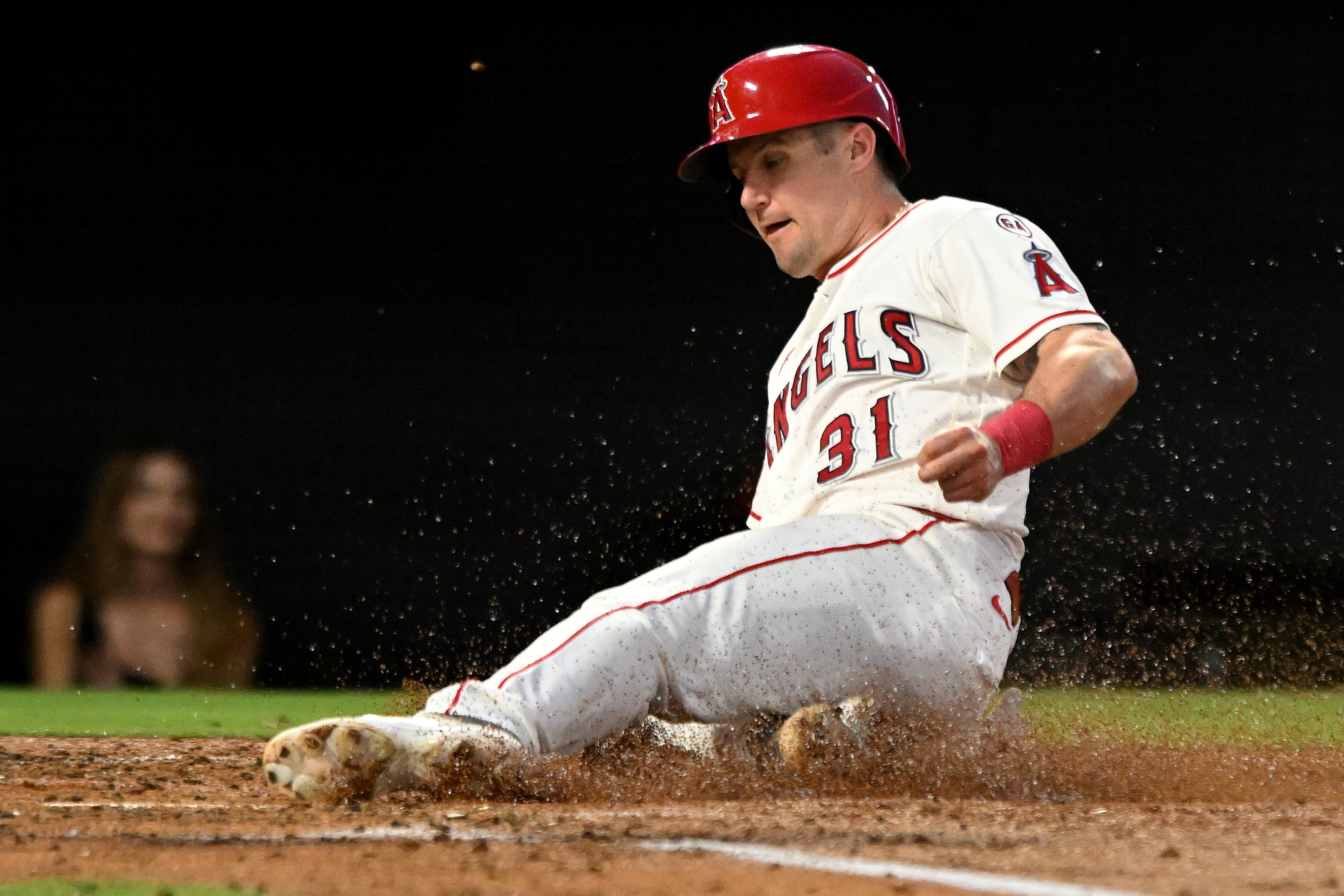 Los Angeles Angels' Tyler Heineman (31) scores a run against the New York Yankees in the third inning of a baseball game Monday, Aug. 31, 2026, in Anaheim, Calif. 