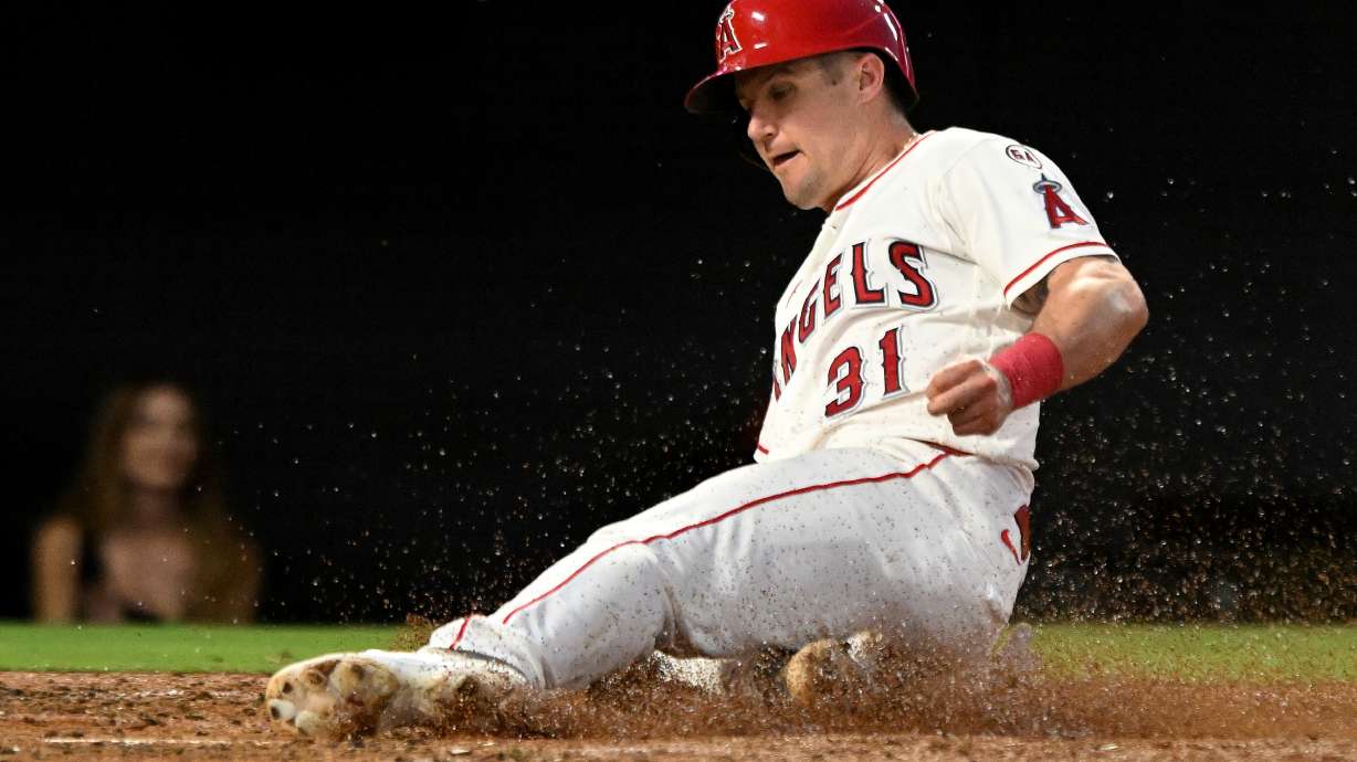 Los Angeles Angels' Tyler Heineman (31) scores a run against the New York Yankees in the third inning of a baseball game Monday, Aug. 31, 2026, in Anaheim, Calif.