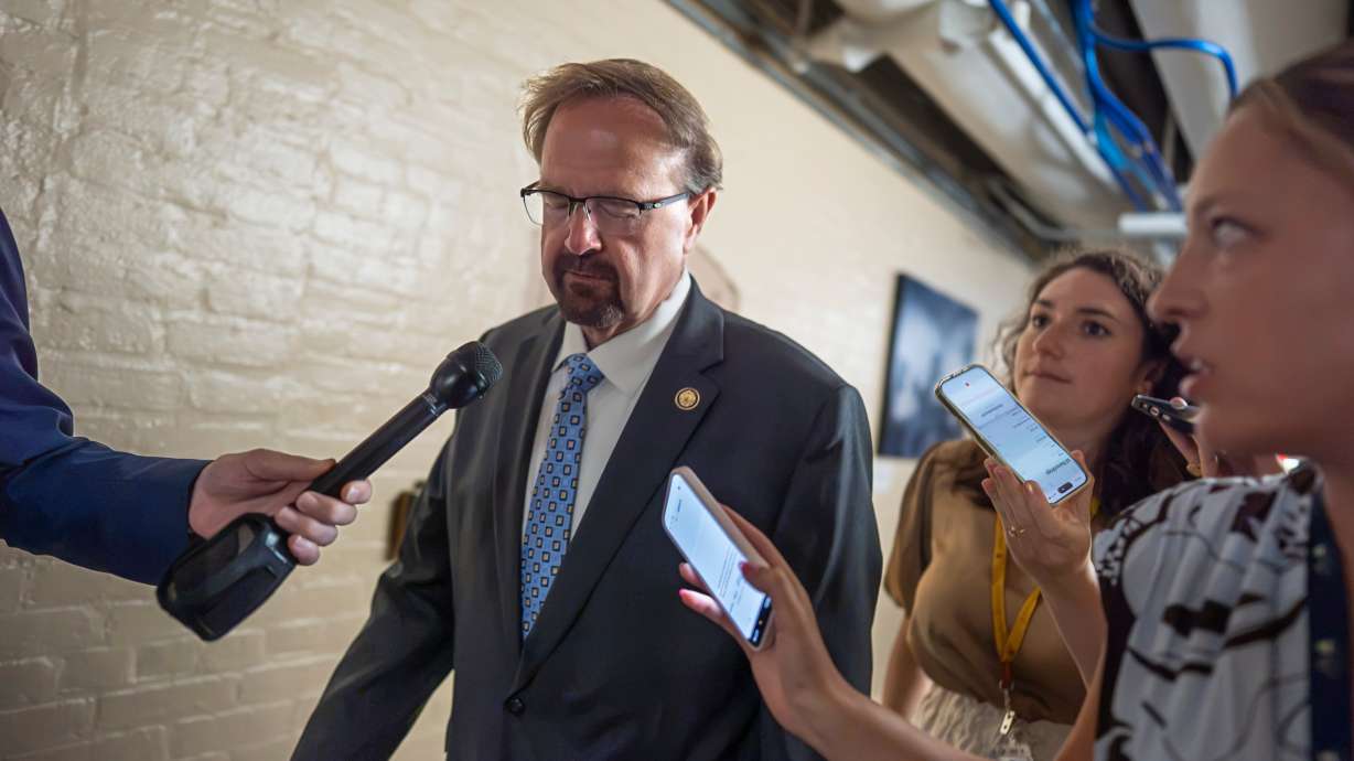 Rep. Chuck Edwards, R-N.C., is met by reporters as he walks to a closed-door meeting with Republican lawmakers at the Capitol in Washington on Tuesday. Edwards was censured for "inappropriate conduct."