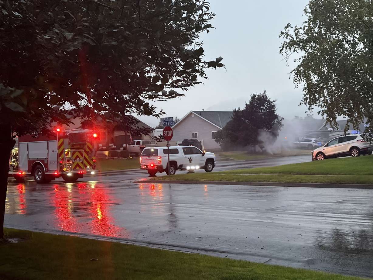 A lightning strike to a tree in Hyrum caused significant damage to a front yard, knocked out power and damaged an underground natural gas line, prompting evacuations in the neighborhood.