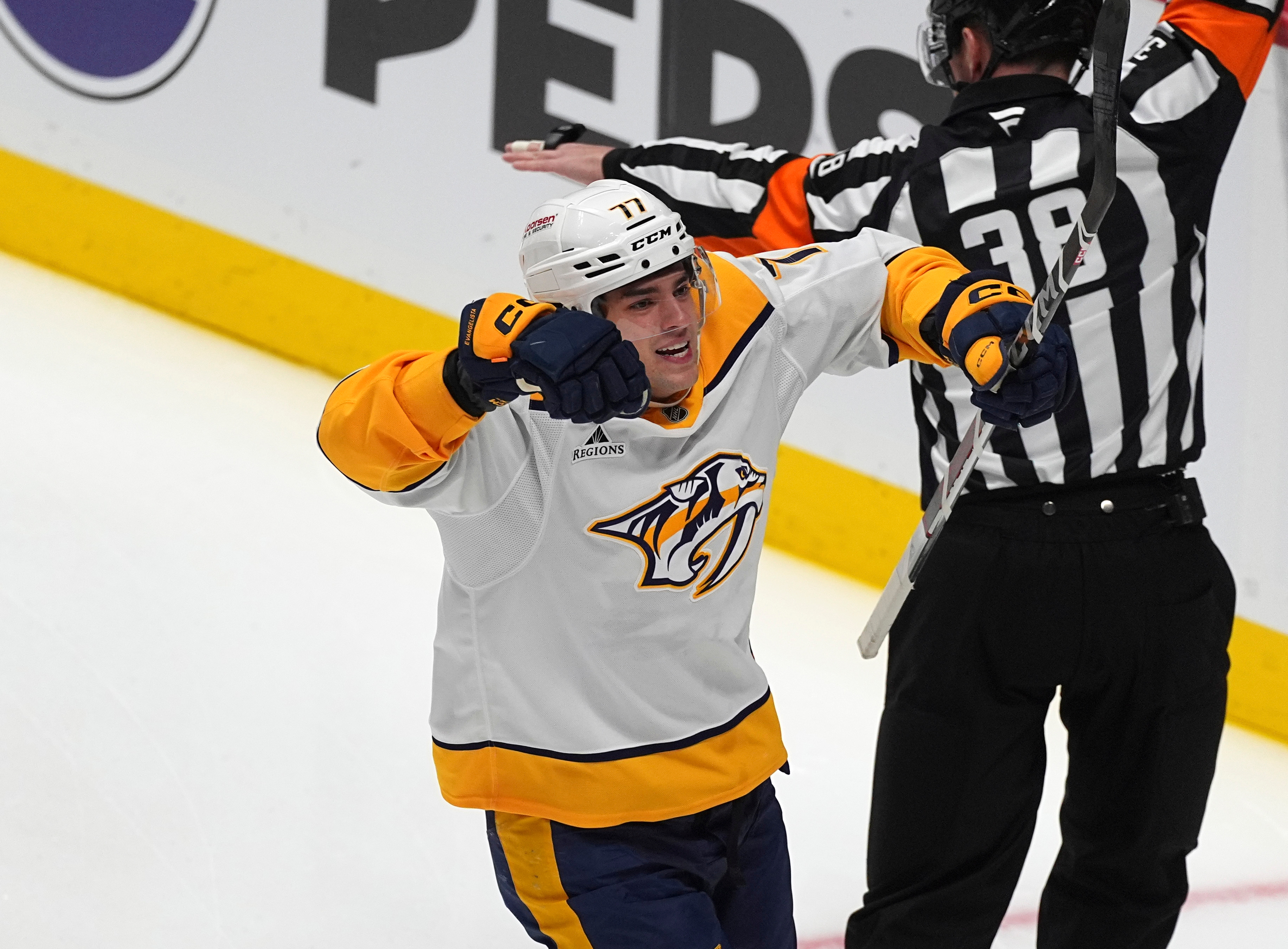 FILE - Nashville Predators right wing Luke Evangelista (77) celebrates after scoring a goal in the first period of an NHL hockey game, on Nov. 11, 2024, in Denver. 