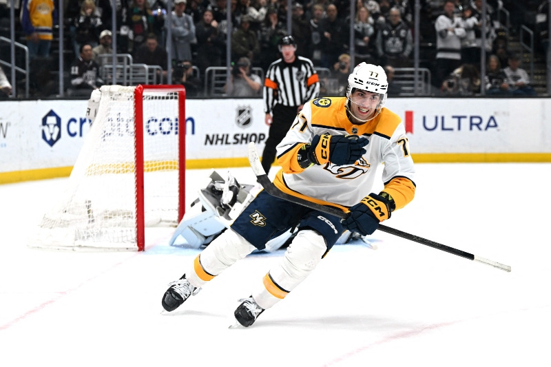 Apr 2, 2026; Los Angeles, California, USA; Nashville Predators right wing Luke Evangelista (77) celebrates after winning the penalty shootout against the Los Angeles Kings at Crypto.com Arena.