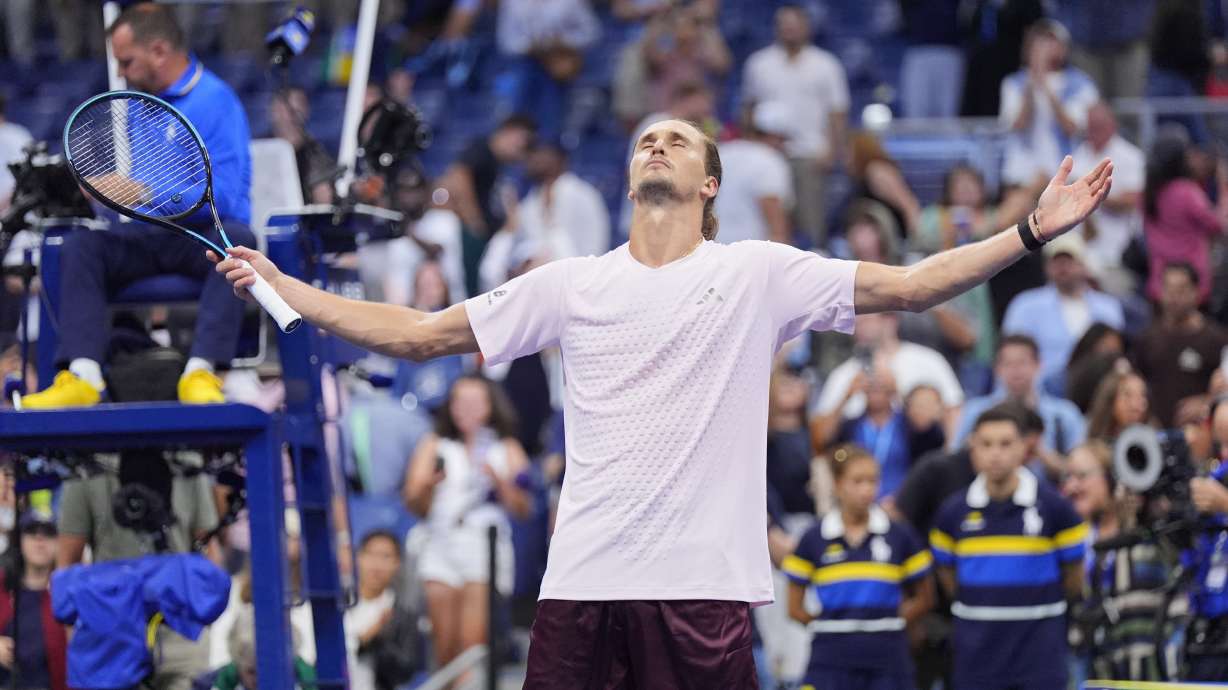 Alexander Zverev, of Germany, celebrates defeating Lorenzo Sonego, of Italy, in five sets In the first round of the U.S. Open tennis championships early Wednesday, Sept. 2, 2026, in New York.