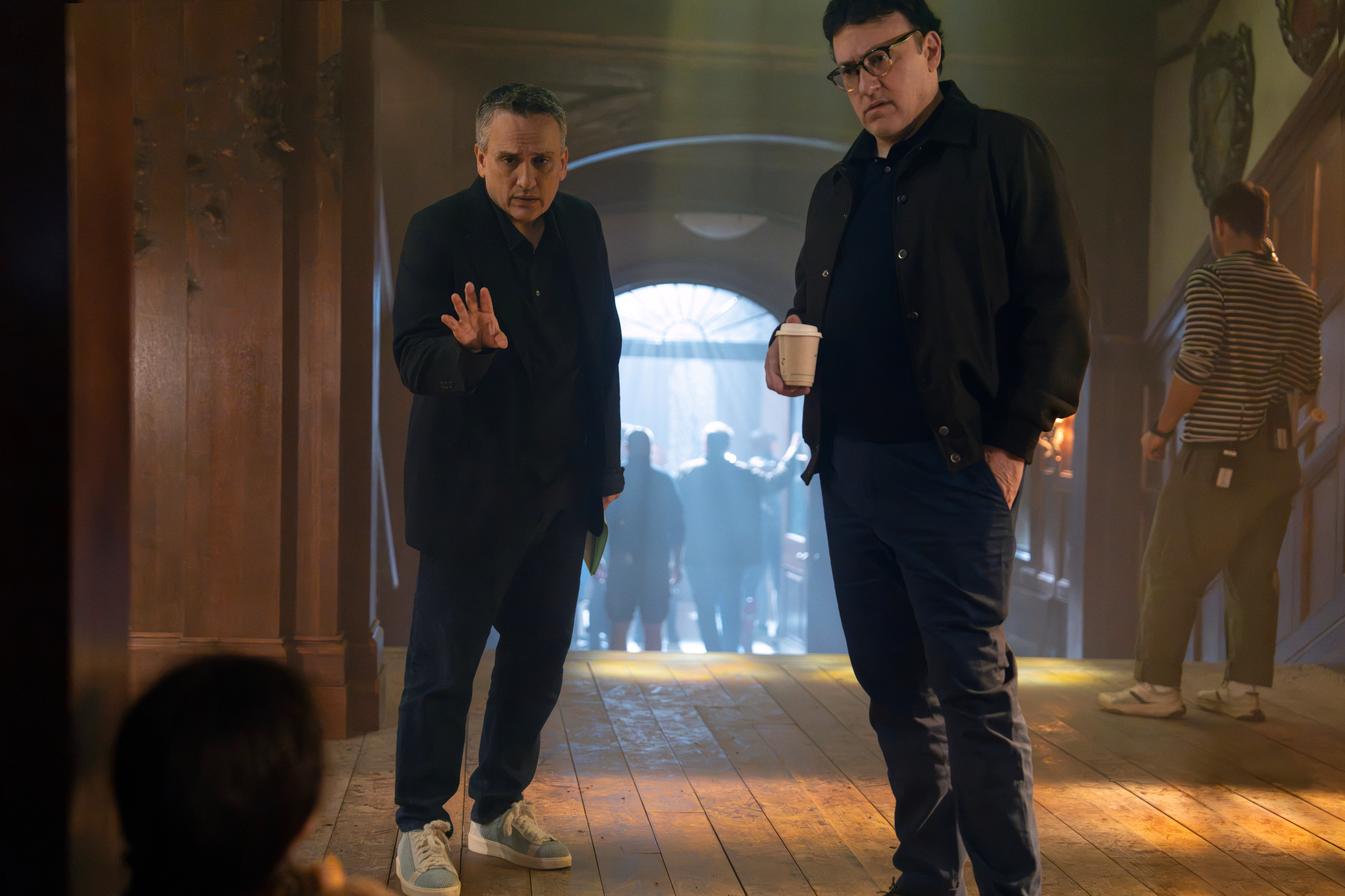 This image released by Marvel shows directors Joe Russo, left, and Anthony Russo on the set of "Avengers: Doomsday." 