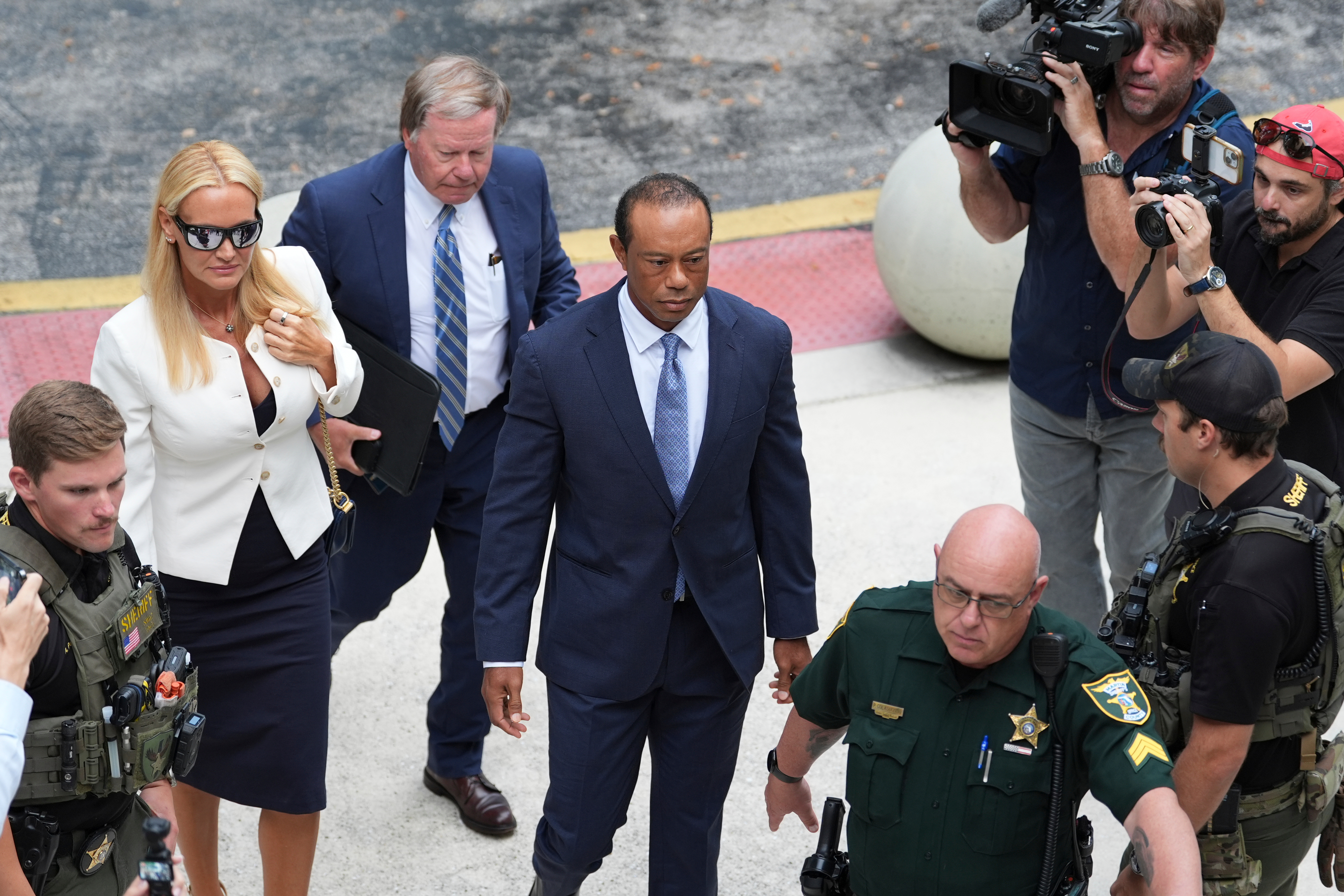 Tiger Woods pleads no contest to reckless driving charge over rollover crash in Florida