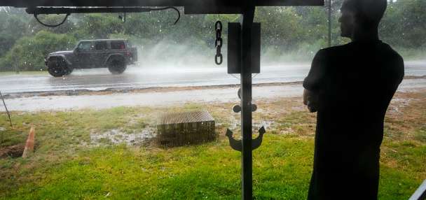Former Tropical Storm Edouard lingers over Texas, flooding homes and roadways