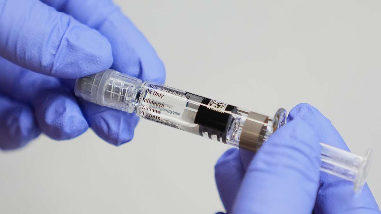 Leading medical groups are urging people to get updated flu and COVID-19 vaccinations this fall, banding together Wednesday to issue guidelines, saying they hope to ease confusion.