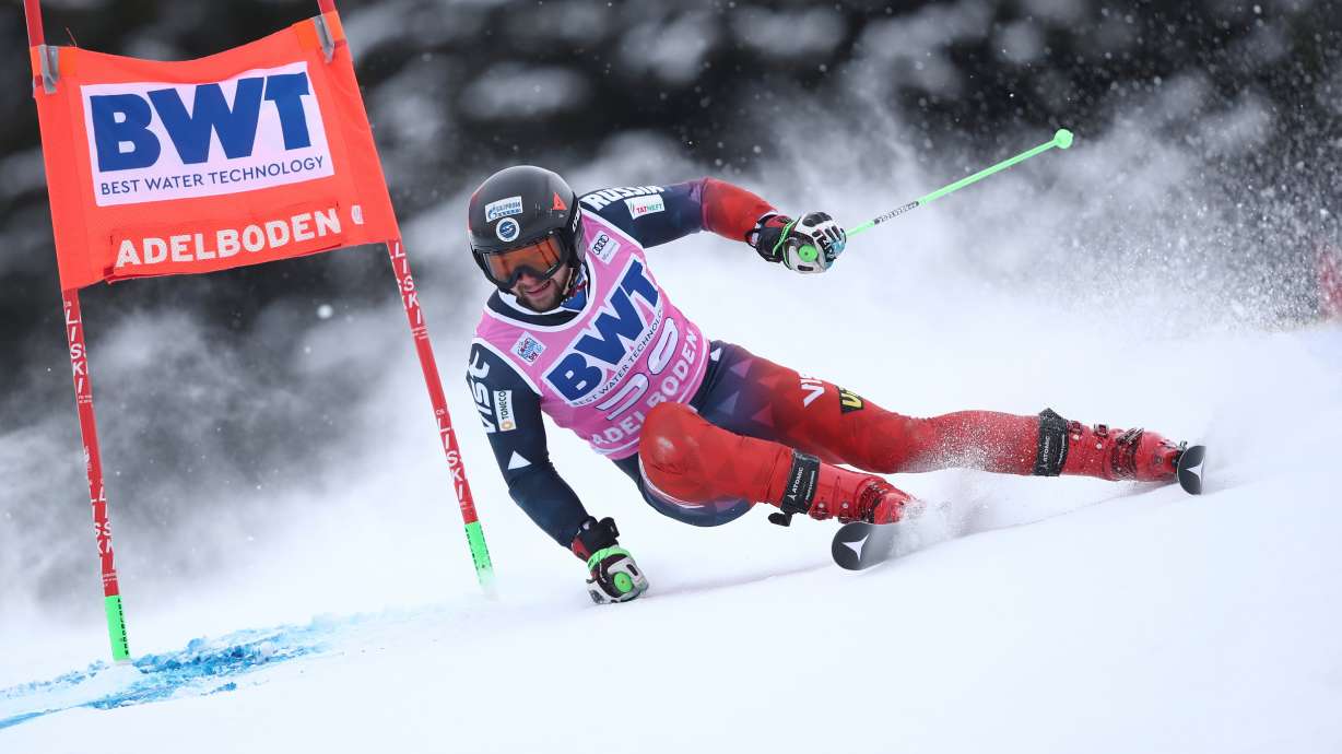 FILE -Russia's Ivan Kuznetsov speeds down the course during an alpine ski, men's World Cup Giant slalom, in Adelboden, Switzerland, Saturday, Jan. 8, 2022.