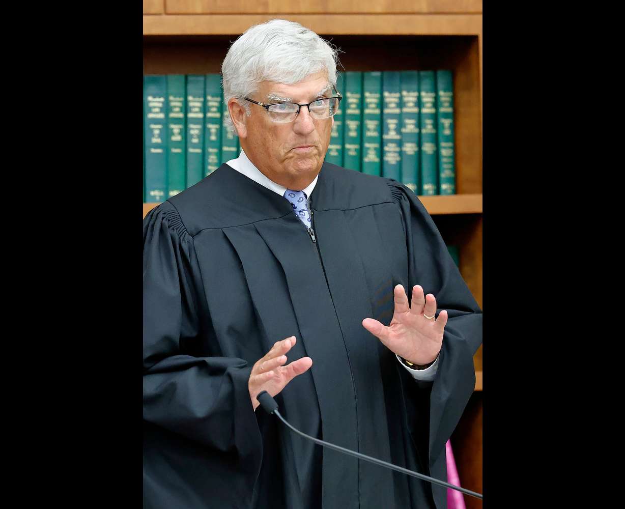 Judge William Sullivan speaks to the press and spectators in the courtroom during Lindsay Clancy's murder trial at Plymouth Superior Court in Plymouth, Mass., Wednesday. Sullivan sent the jury home after it couldn't reach a verdict for a fifth straight day.