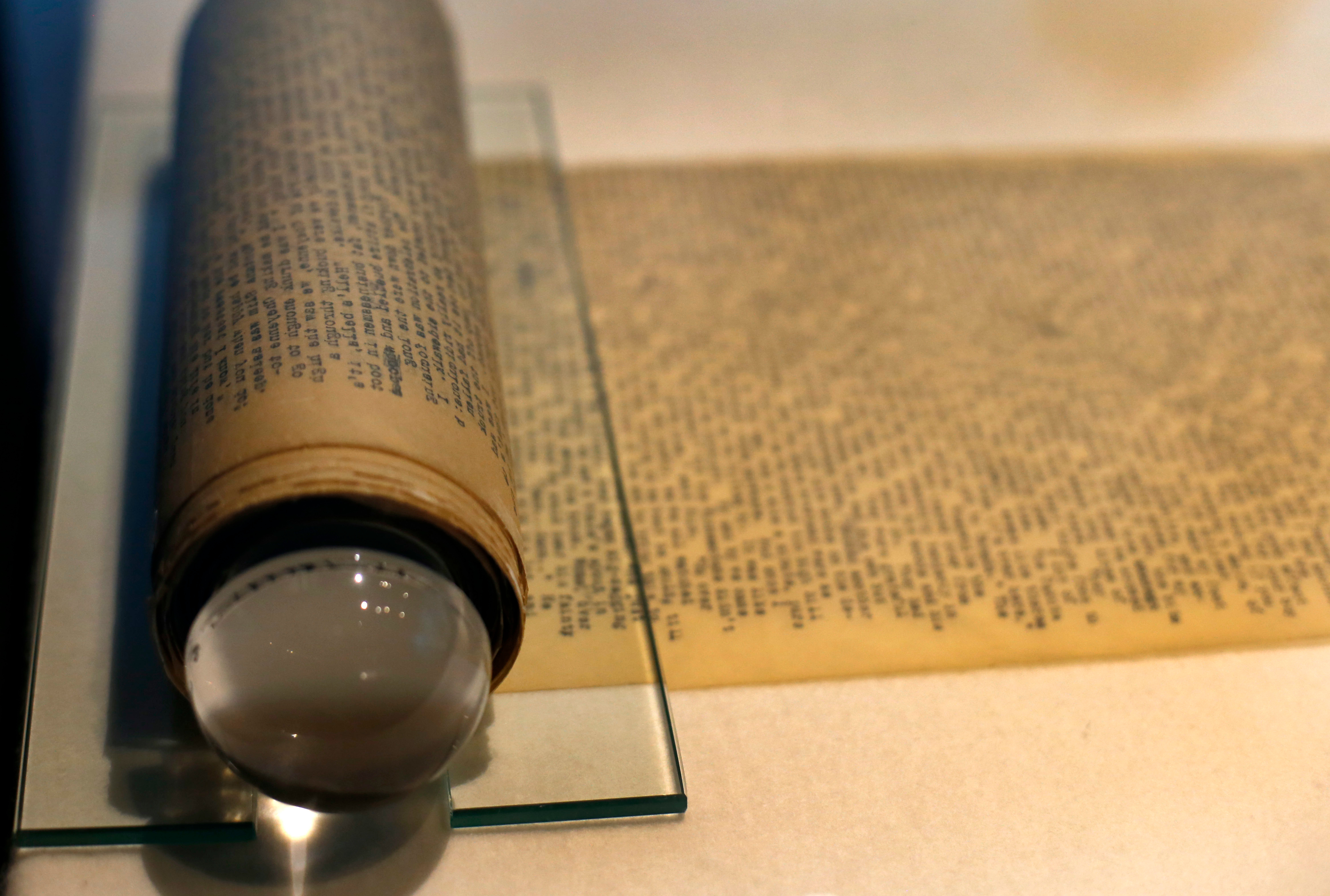 FILE - Jack Kerouac's "On the Road" and its working manuscript, the extraordinary 120-foot scroll he would unfurl before startled publishers, sits on display at the American Writers Museum in Chicago, May 8, 2017. 