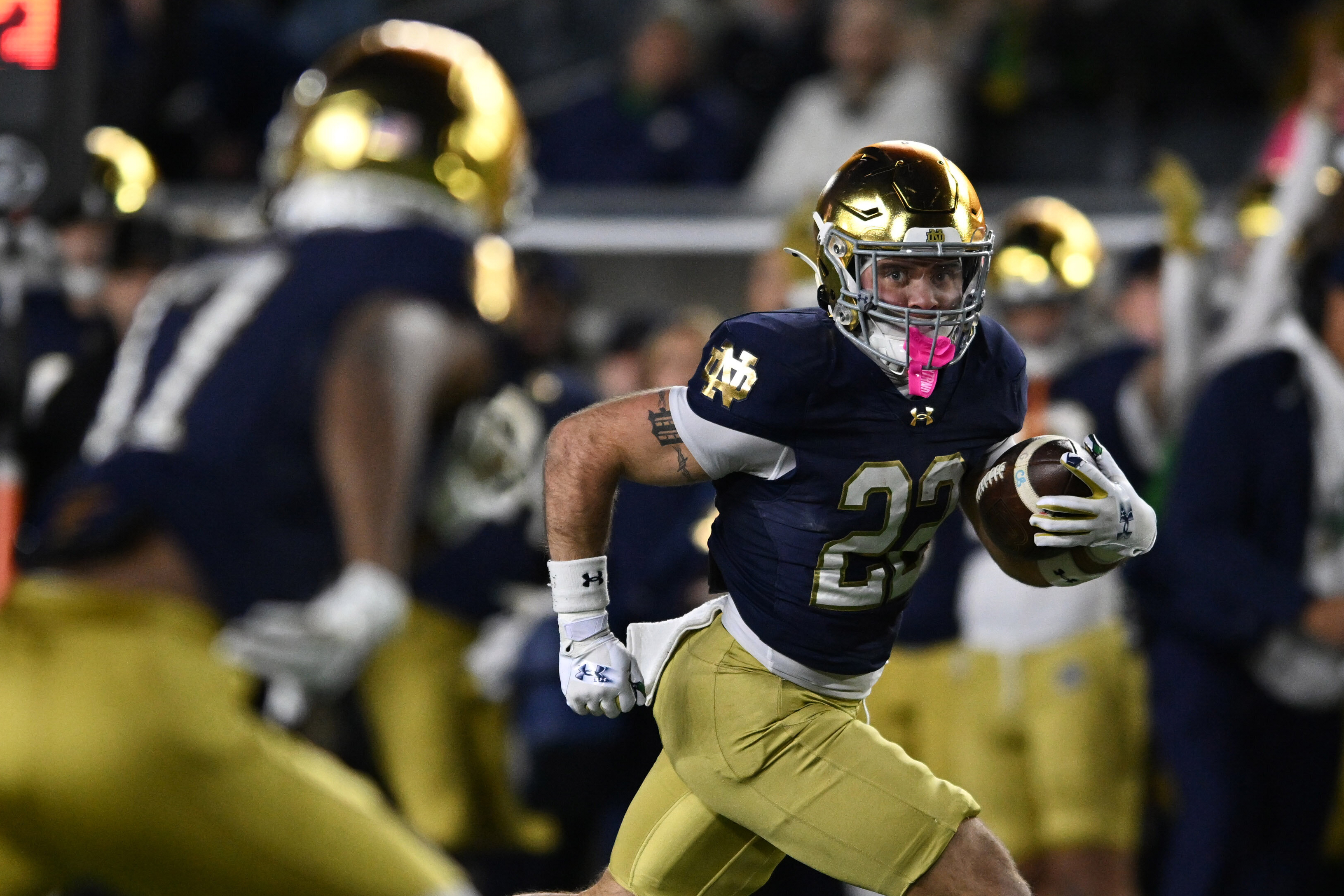 FILE - Notre Dame running back Aneyas Williams (22) rushes for a touchdown during the fourth quarter of an NCAA football game against Syracuse, Nov. 22, 2025, in South Bend, Ind. 