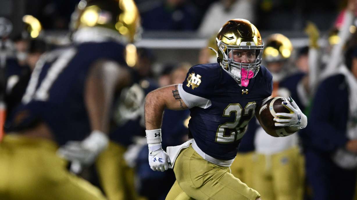 FILE - Notre Dame running back Aneyas Williams (22) rushes for a touchdown during the fourth quarter of an NCAA football game against Syracuse, Nov. 22, 2025, in South Bend, Ind.