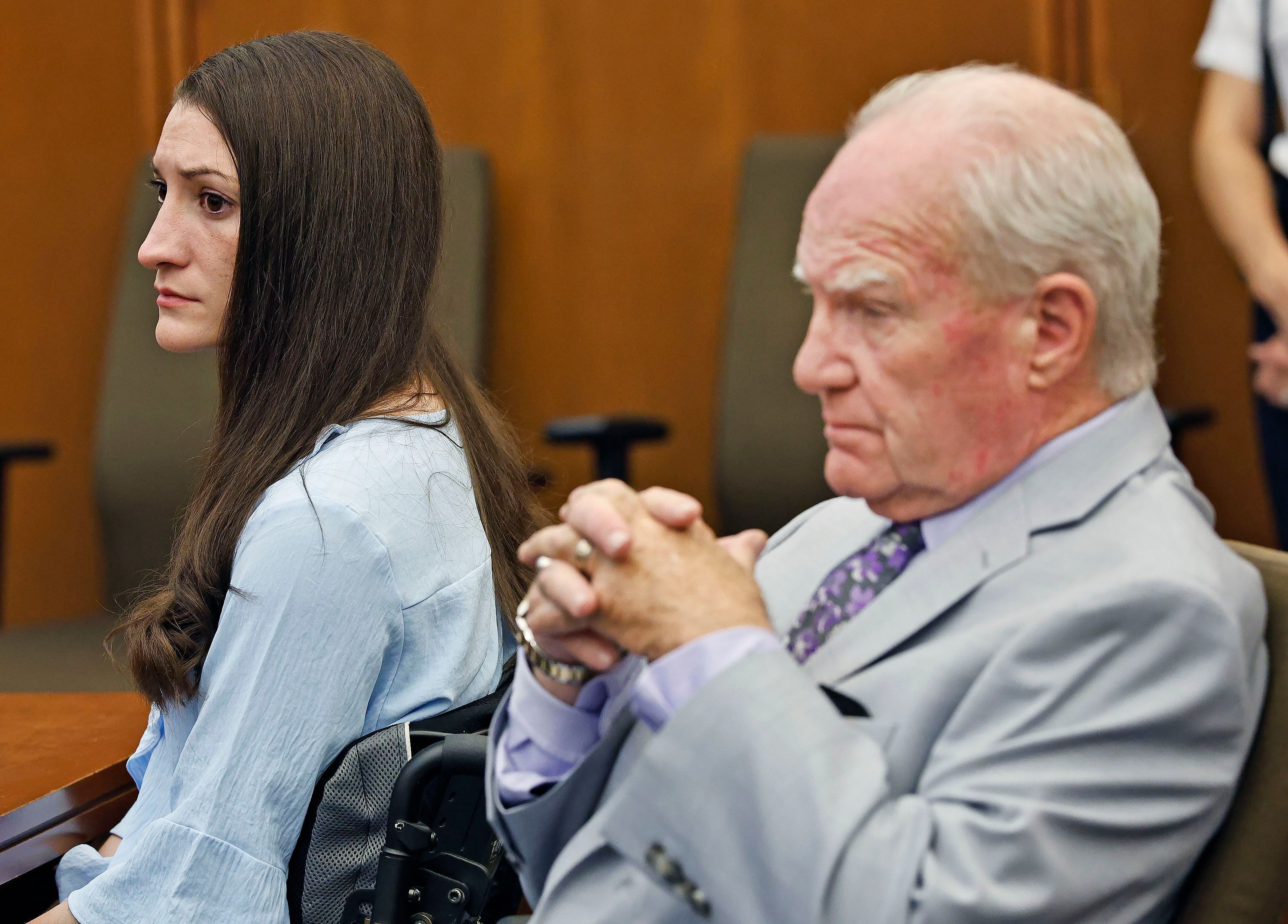 Lindsay Clancy and attorney Kevin Reddington watch jurors as Judge William Sullivan asks them to continue deliberations. The jury has come back for the second time to say they could not reach a unanimous verdict.