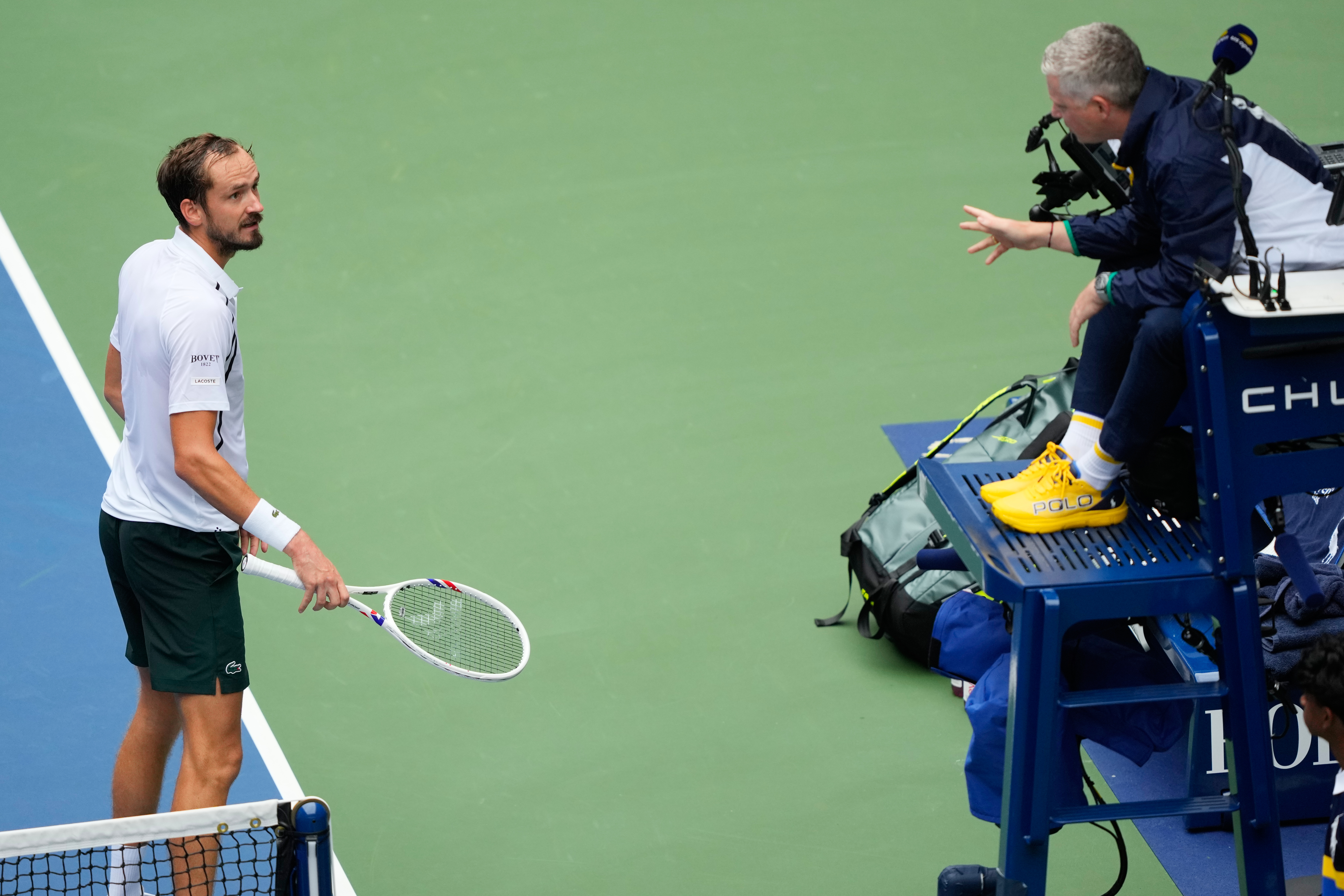 Daniil Medvedev, of Russia, left, talks with the official during the second round of the U.S. Open tennis championships against Sebastian Gorzny, of the United States, Wednesday, Sept. 2, 2026, in New York. 
